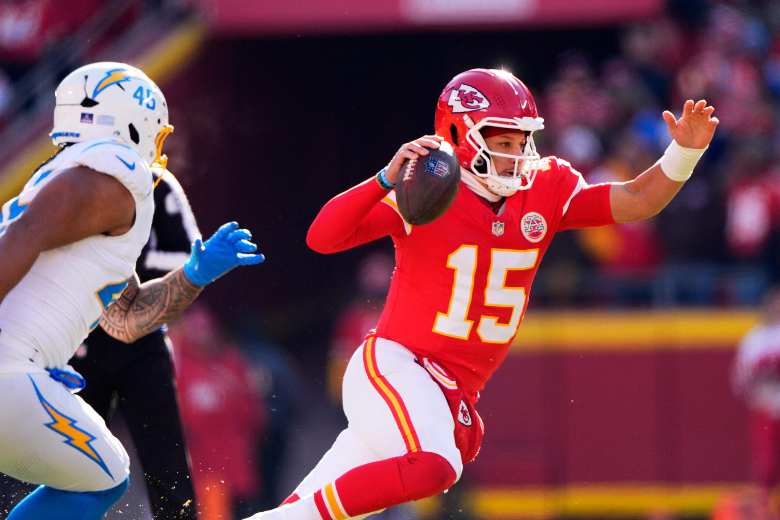 Kansas City Chiefs quarterback Patrick Mahomes (15) scrambles during the...