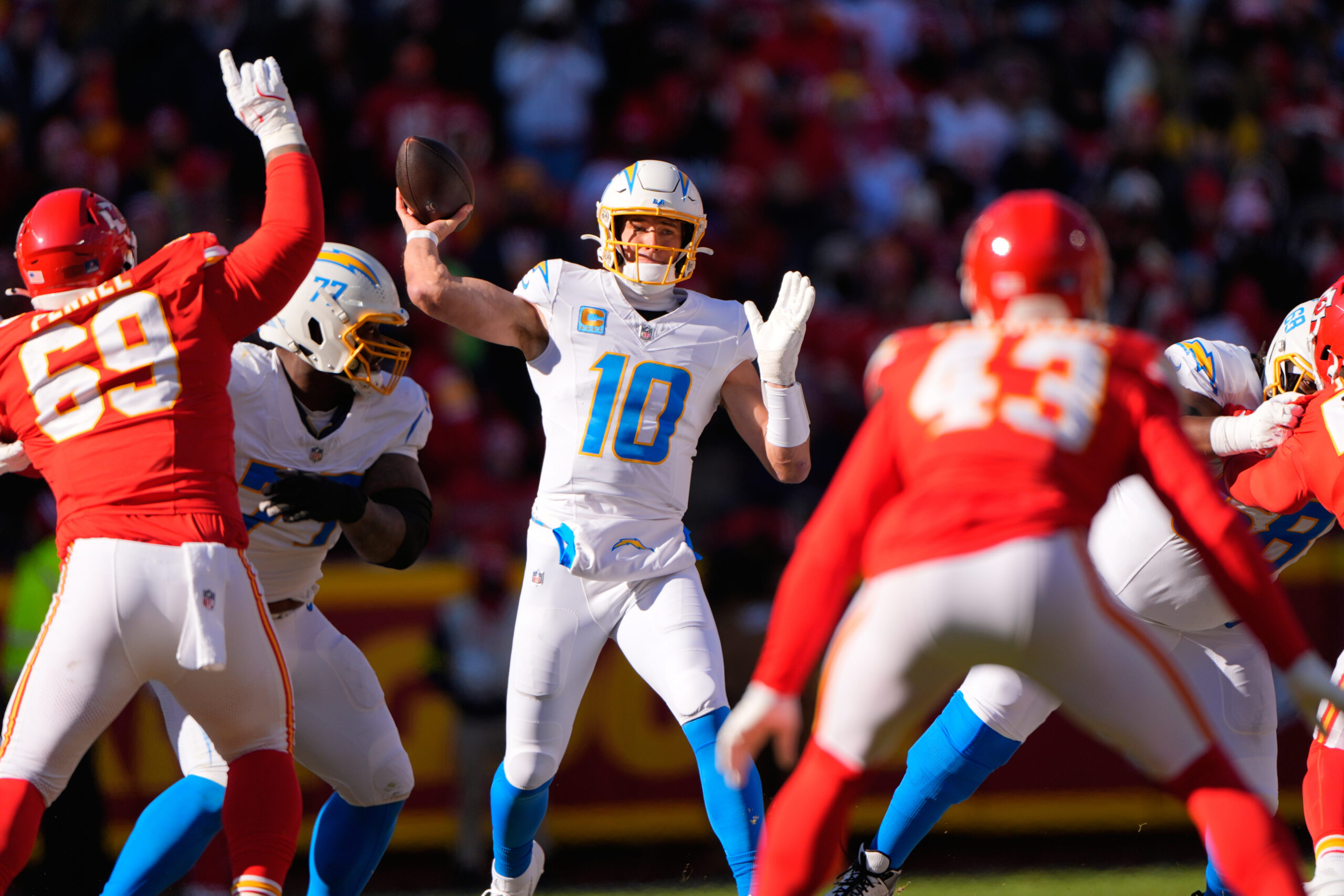 Chargers quarterback Justin Herbert (10) throws during the first half...