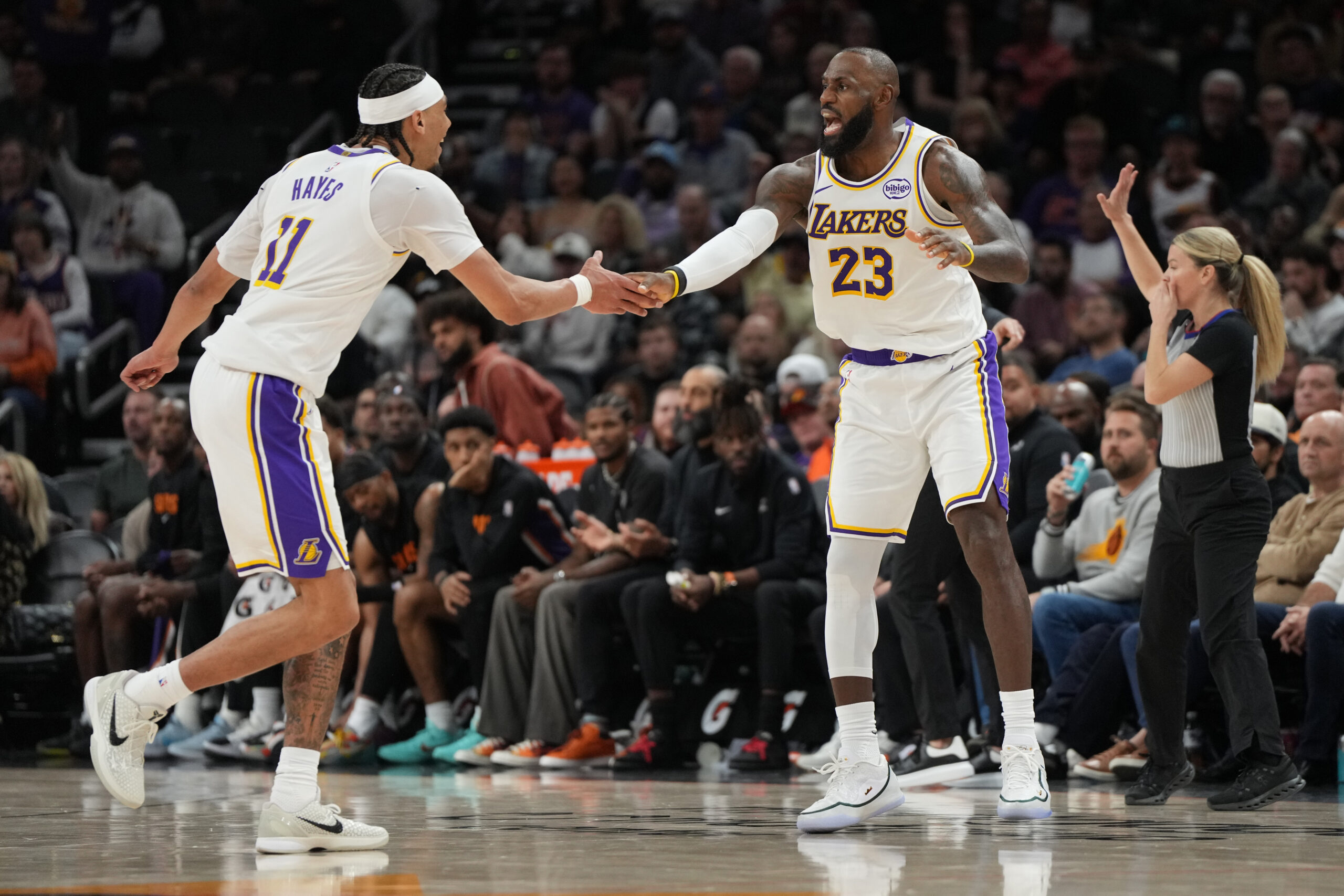 Lakers center Jaxson Hayes (11) and forward Lebron James (23)...