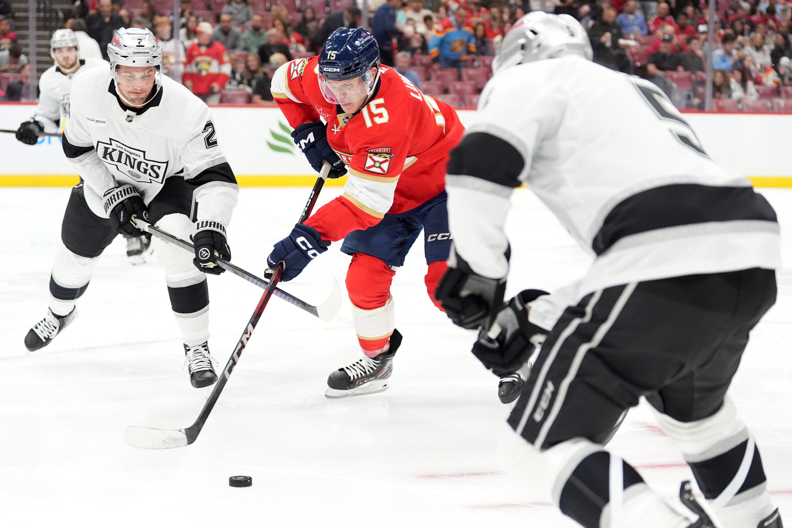 Florida Panthers center Anton Lundell (15) skates down the ice...
