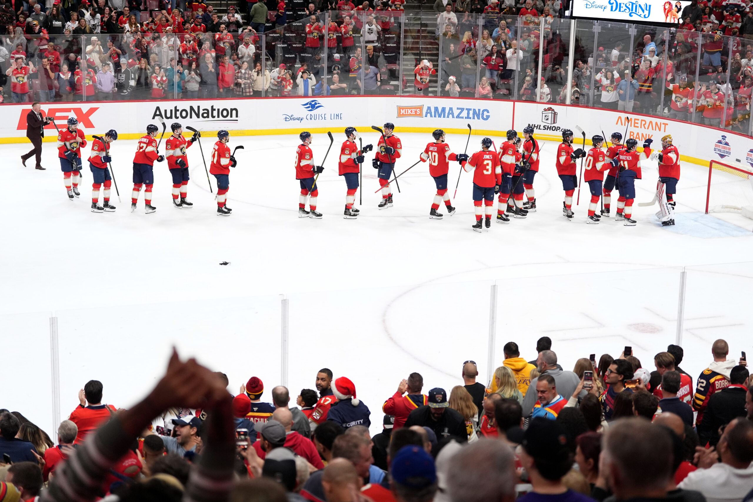 Florida Panthers players celebrate after their 3-2 victory over the...