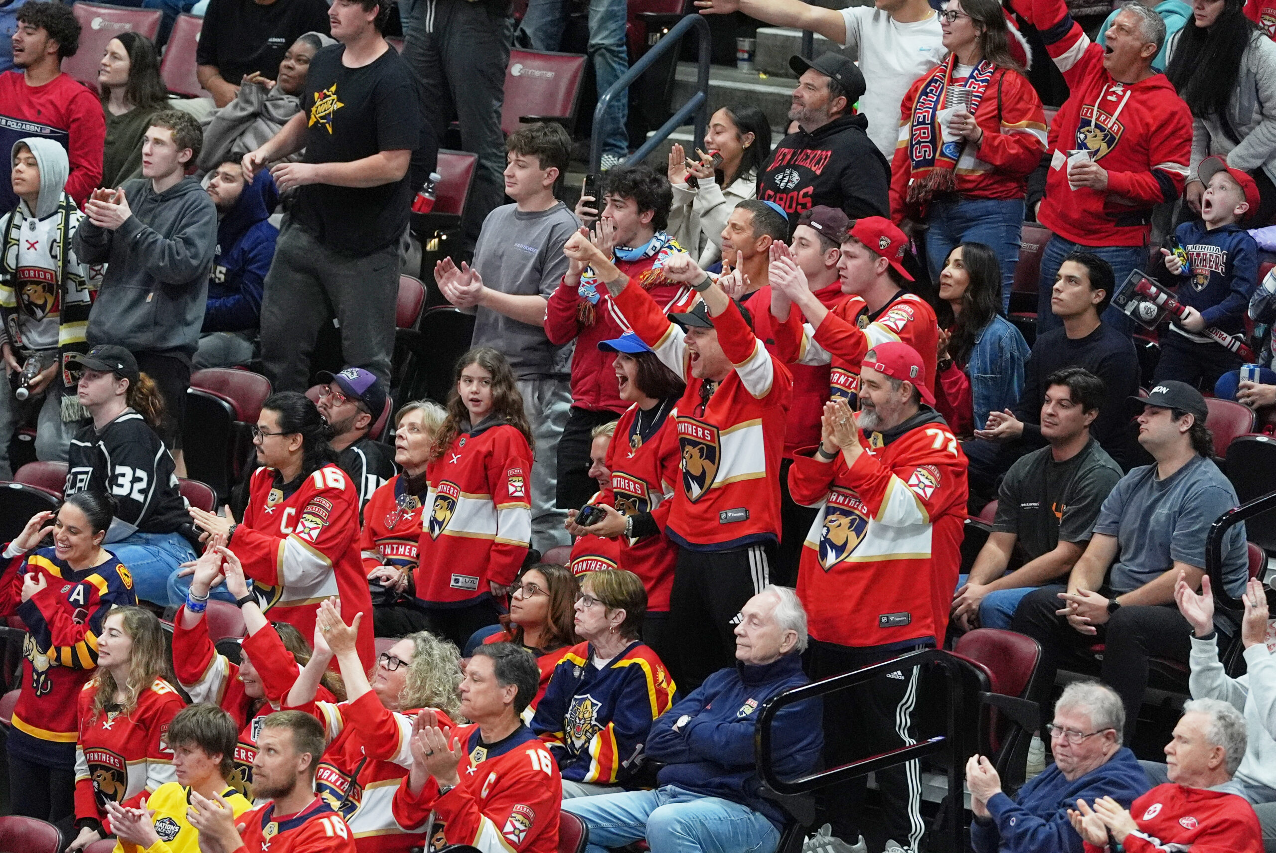 Florida Panthers fans cheer as goaltender Daniil Tarasov denies the...