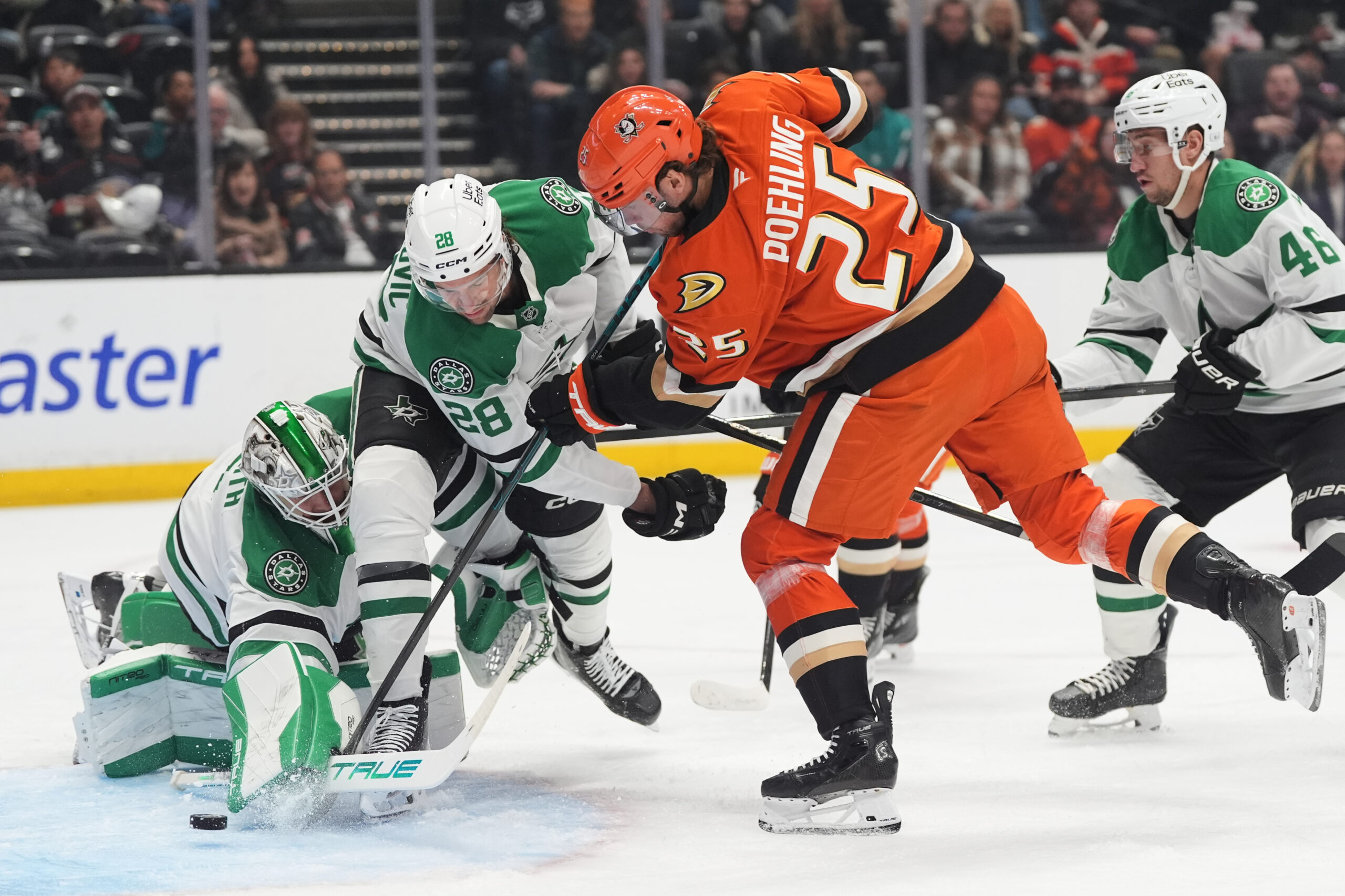 Ducks center Ryan Poehling (25) scores a goal as Dallas...