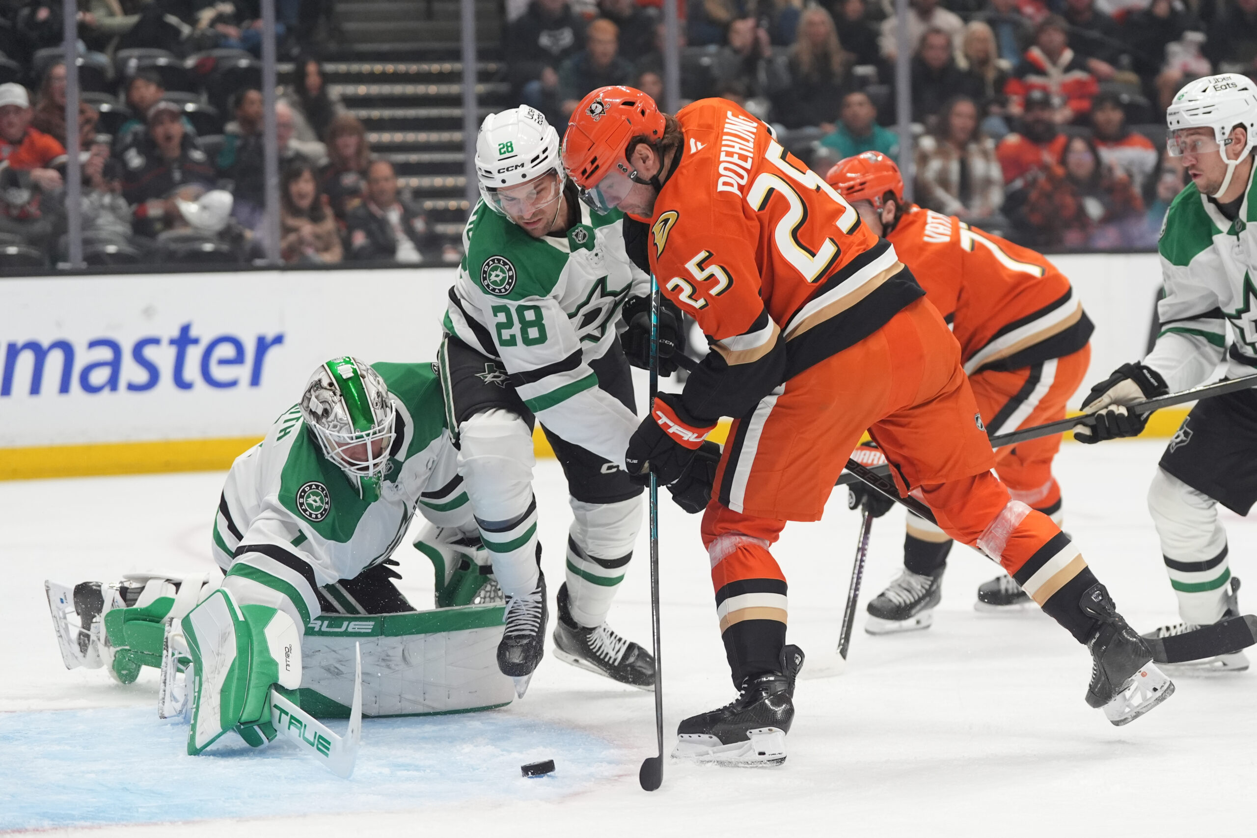 Ducks center Ryan Poehling (25) scores a goal as Dallas...
