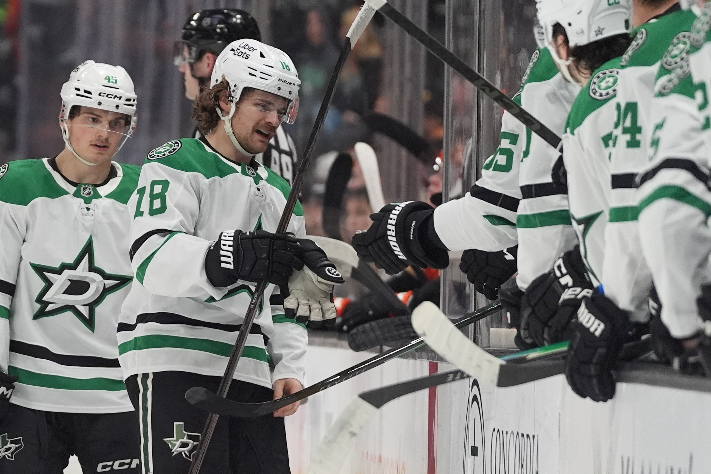 Dallas Stars center Sam Steel, second from left, celebrates with...