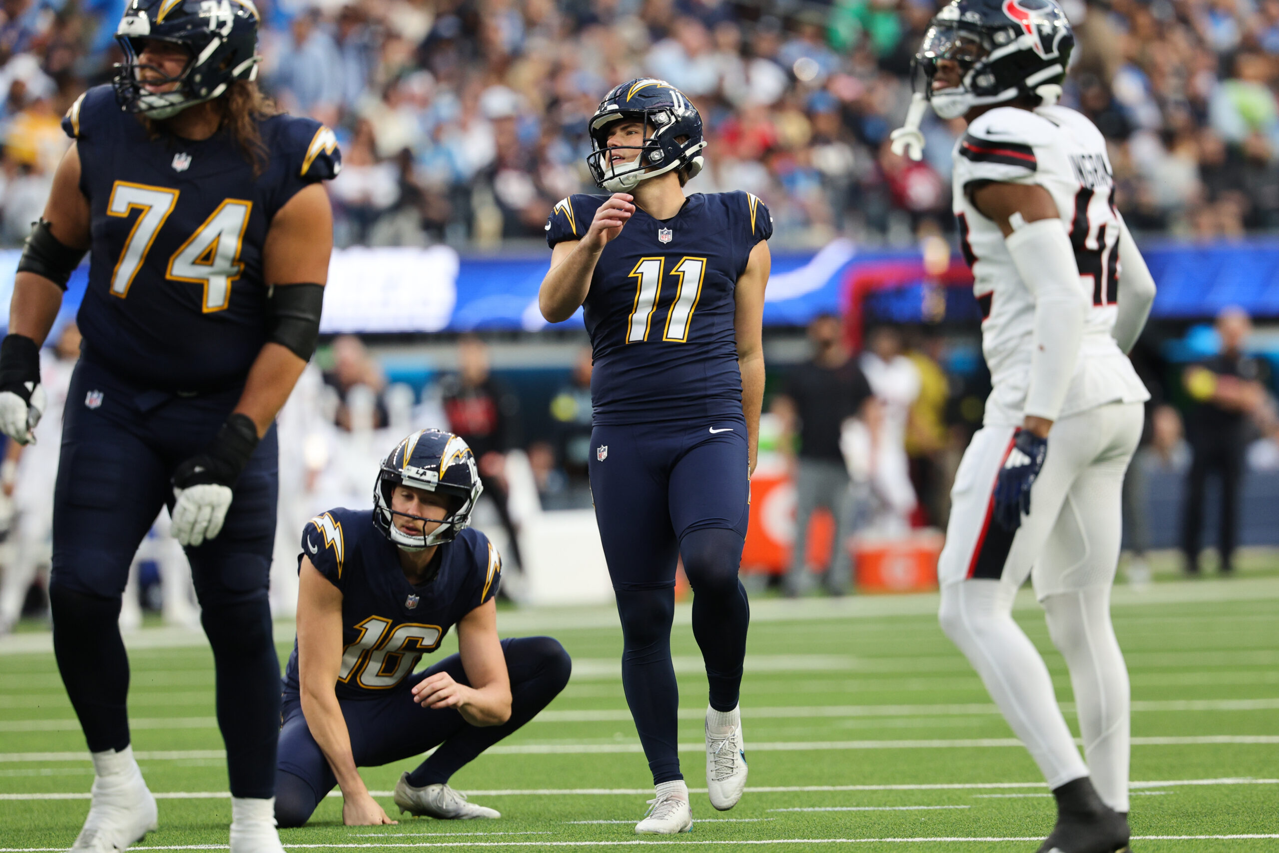 Los Angeles Chargers place kicker Cameron Dicker (11) watches his...