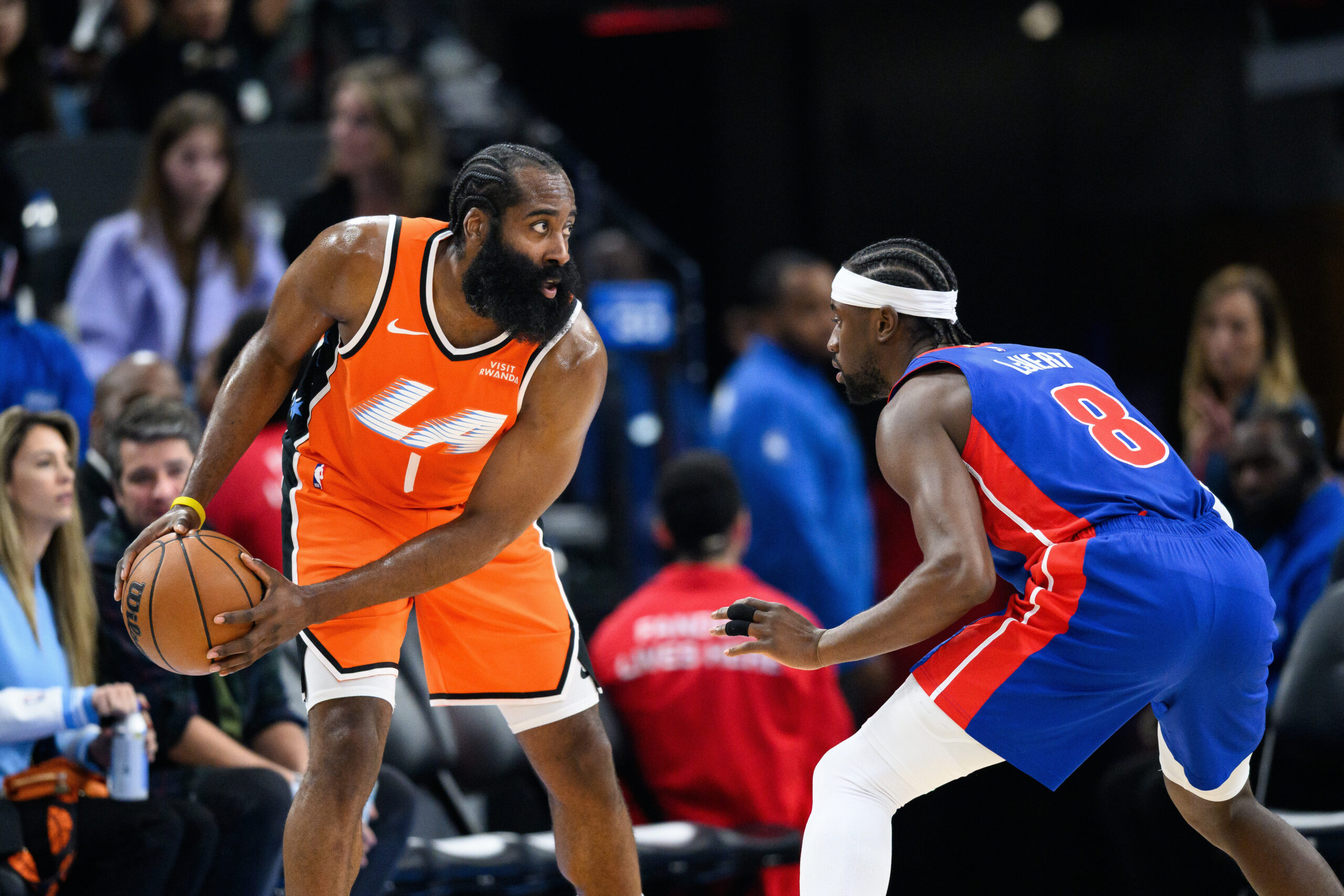 Clippers guard James Harden (1) looks to drive the ball...