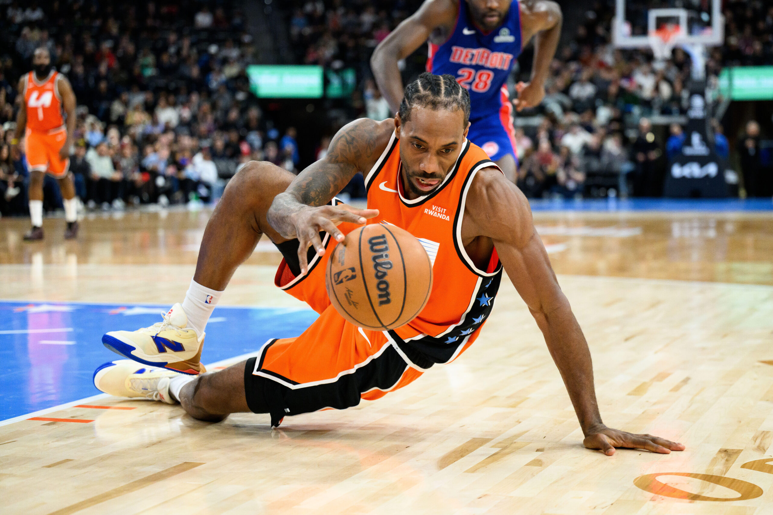 Clippers forward Kawhi Leonard controls the ball during the second...