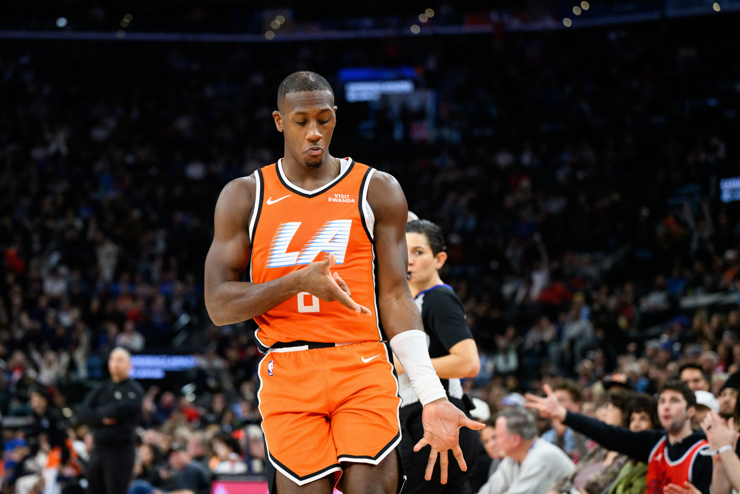 Clippers guard Kris Dunn gestures after scoring during the second...