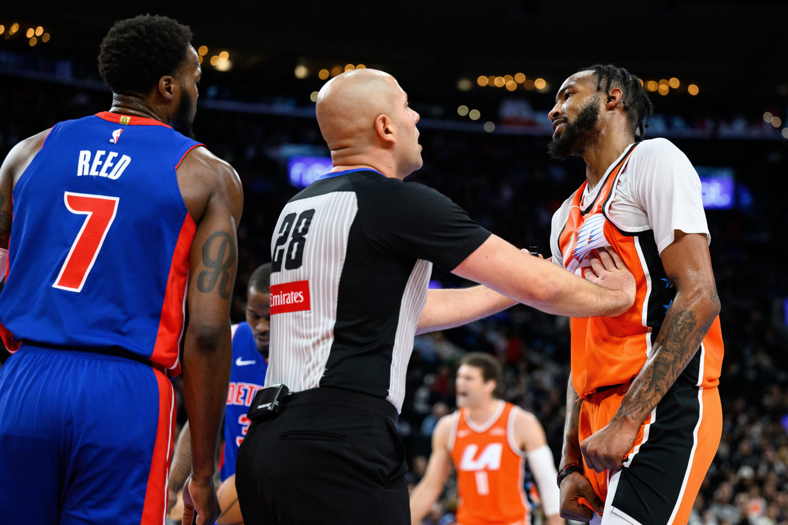 Clippers forward Derrick Jones Jr., right, argues with Detroit Pistons...