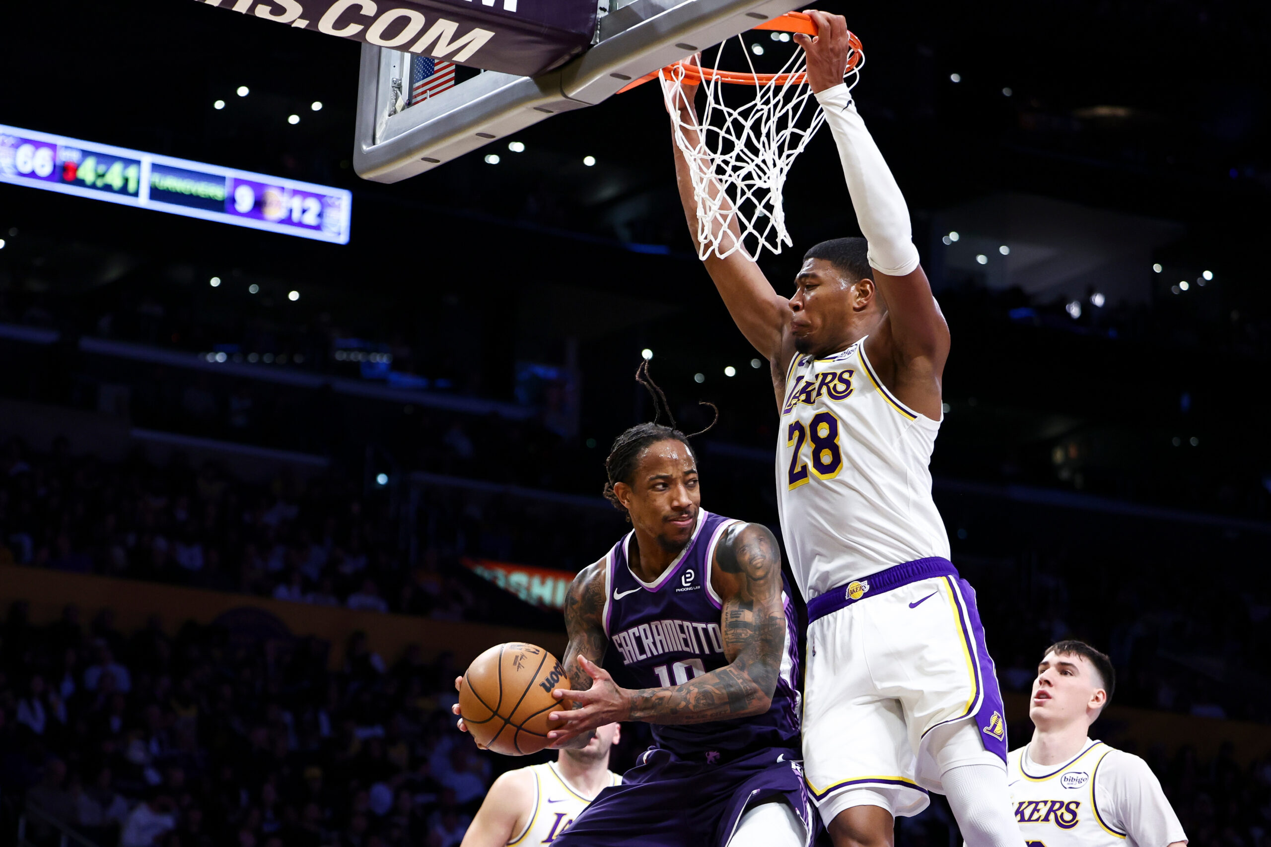 Sacramento Kings guard Demar Derozan, second from left, looks to...