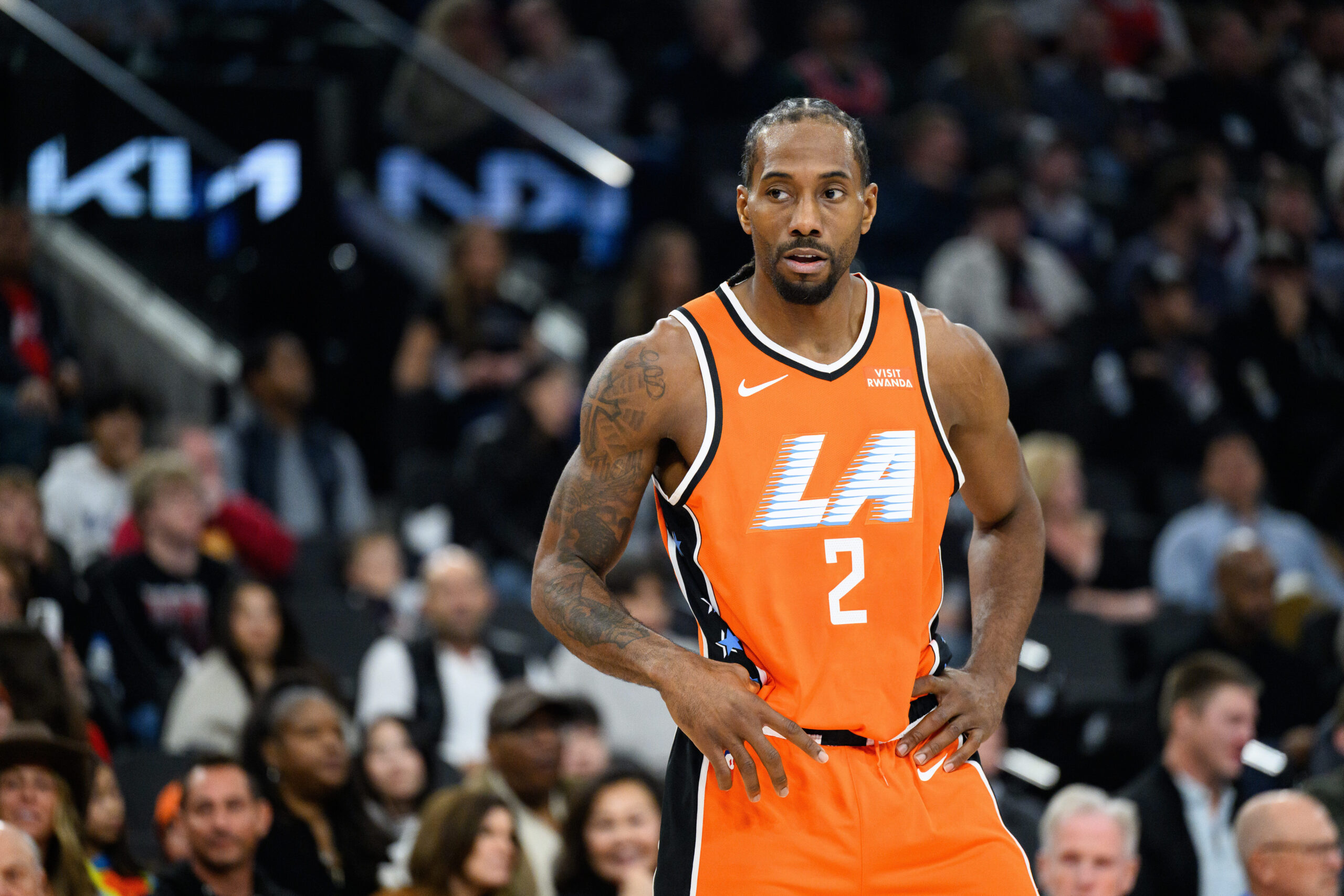 Clippers forward Kawhi Leonard looks on during the first half...