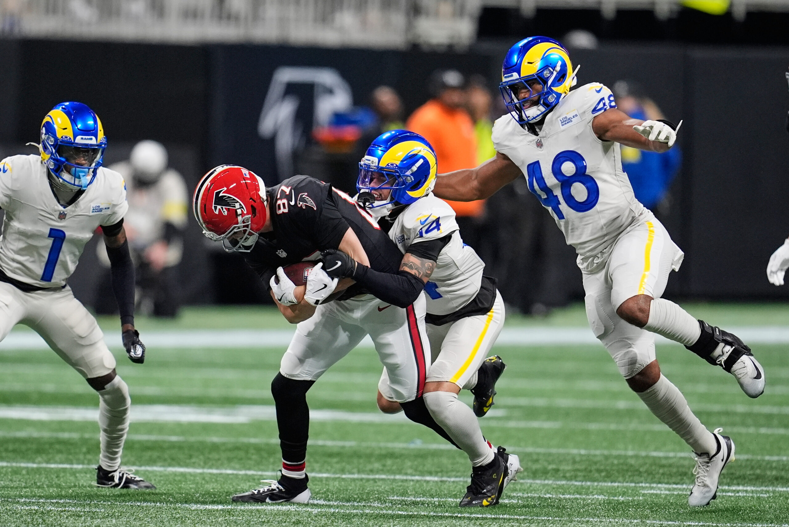 Atlanta Falcons wide receiver David Sills V (87) carries against...
