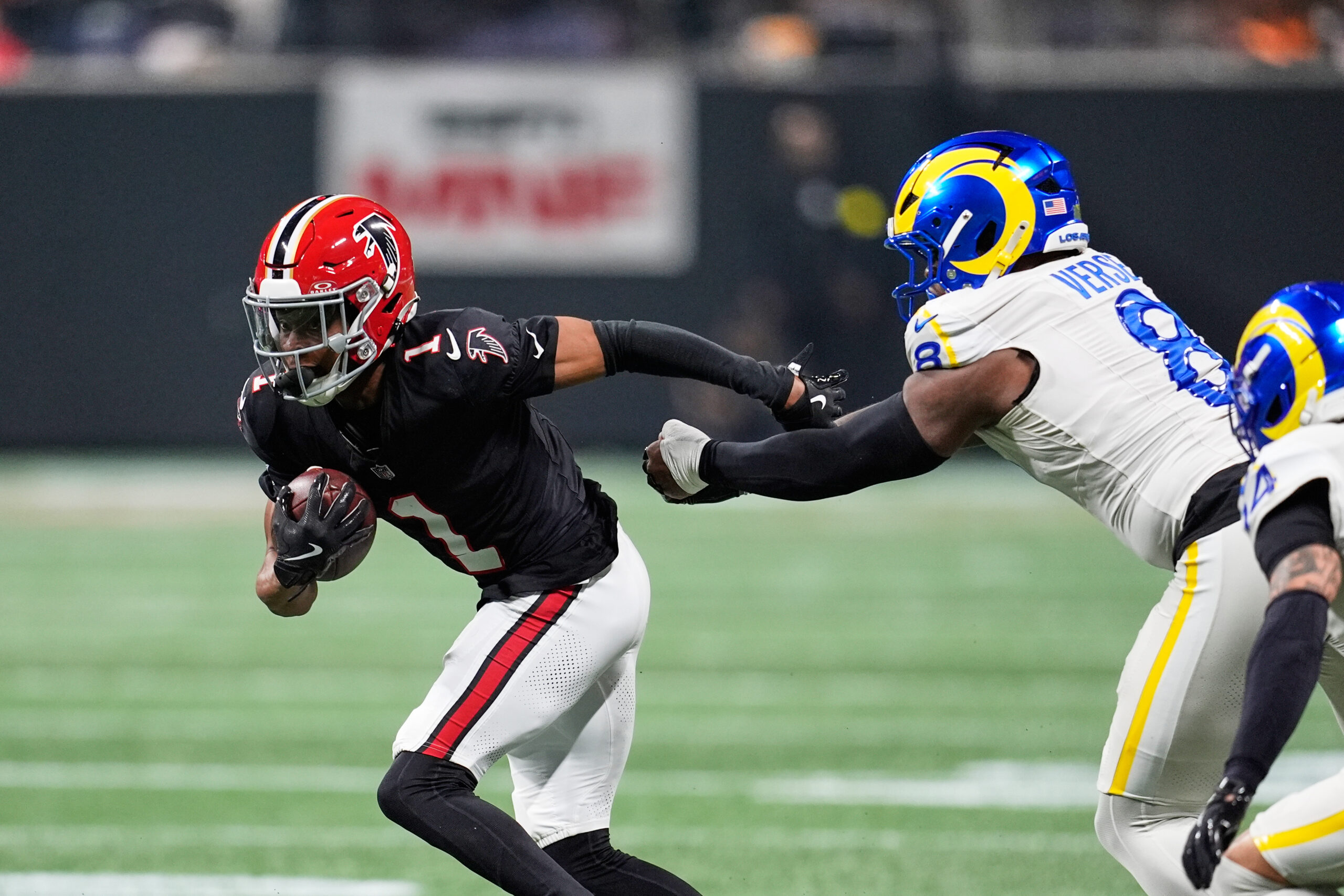 Atlanta Falcons wide receiver Darnell Mooney (1) carries against Los...