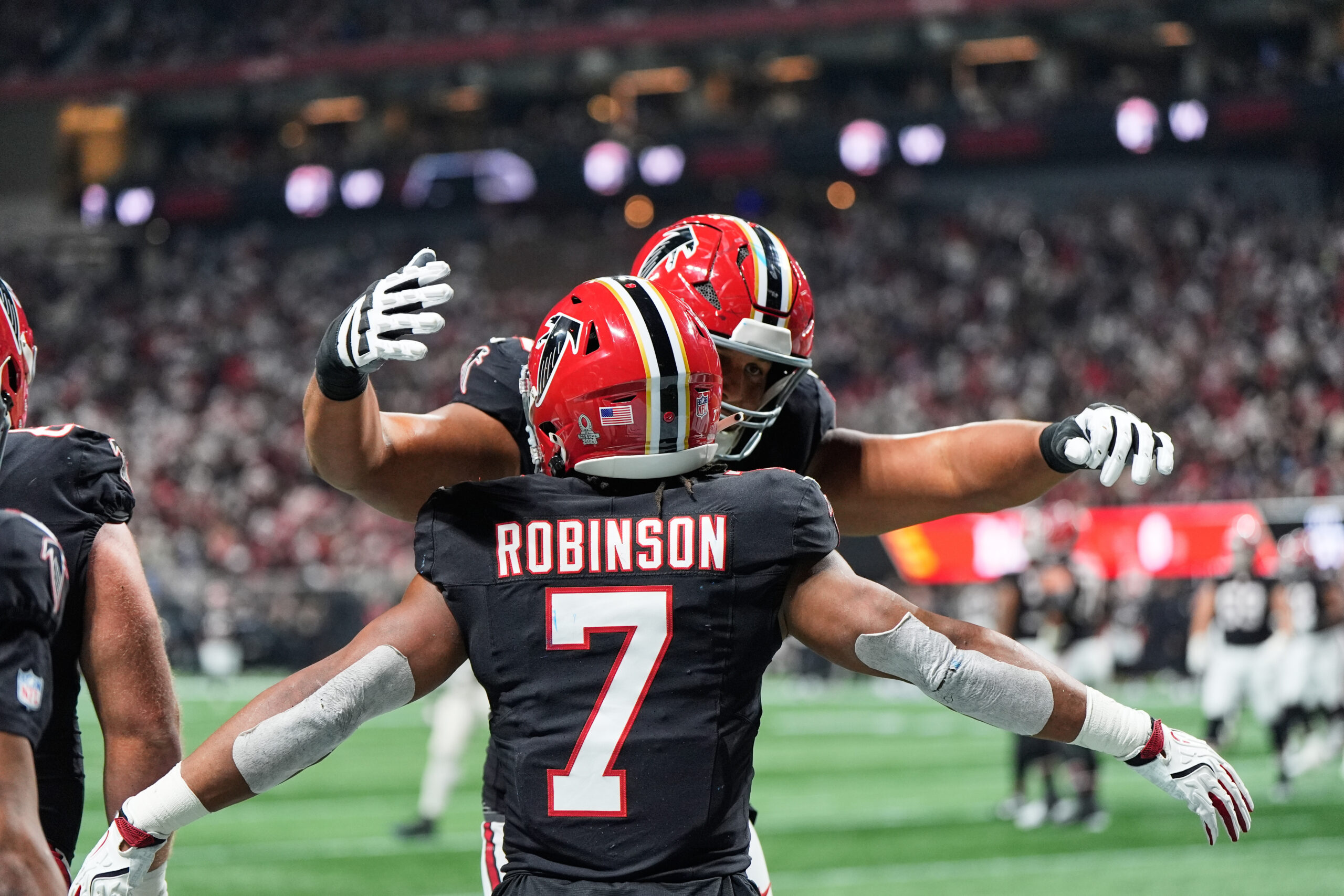 Atlanta Falcons running back Bijan Robinson (7) celebrates his touchdown...