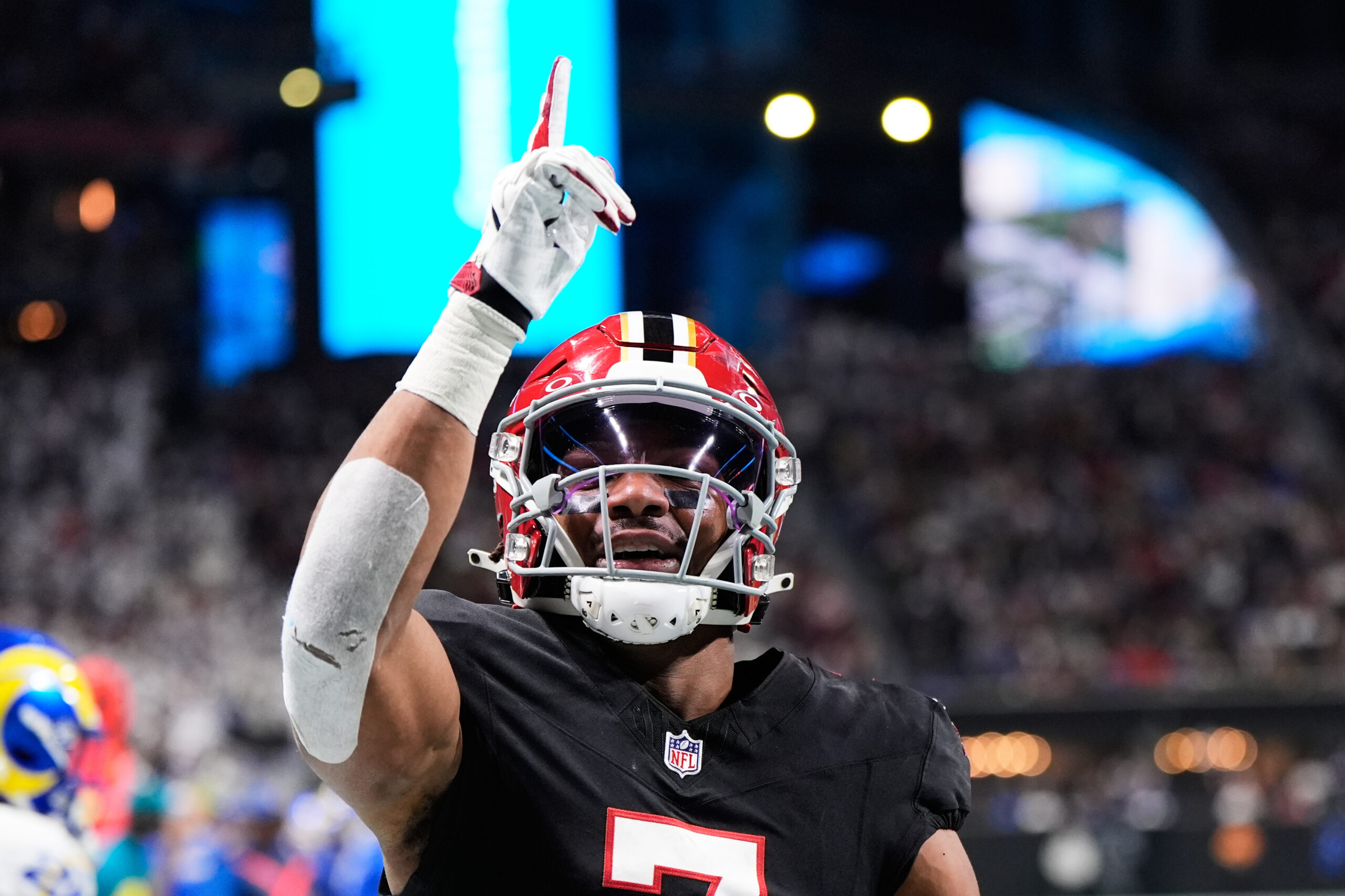 Atlanta Falcons running back Bijan Robinson (7) celebrates his touchdown...