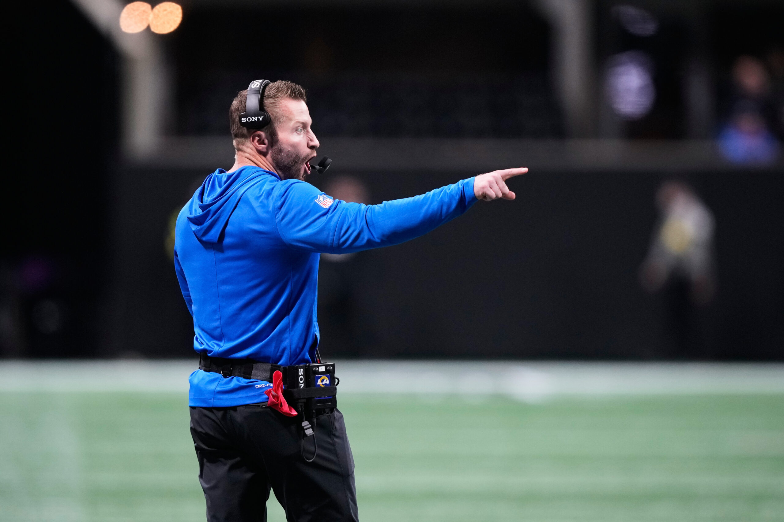 Rams head coach Sean McVay calls out from the sideline...