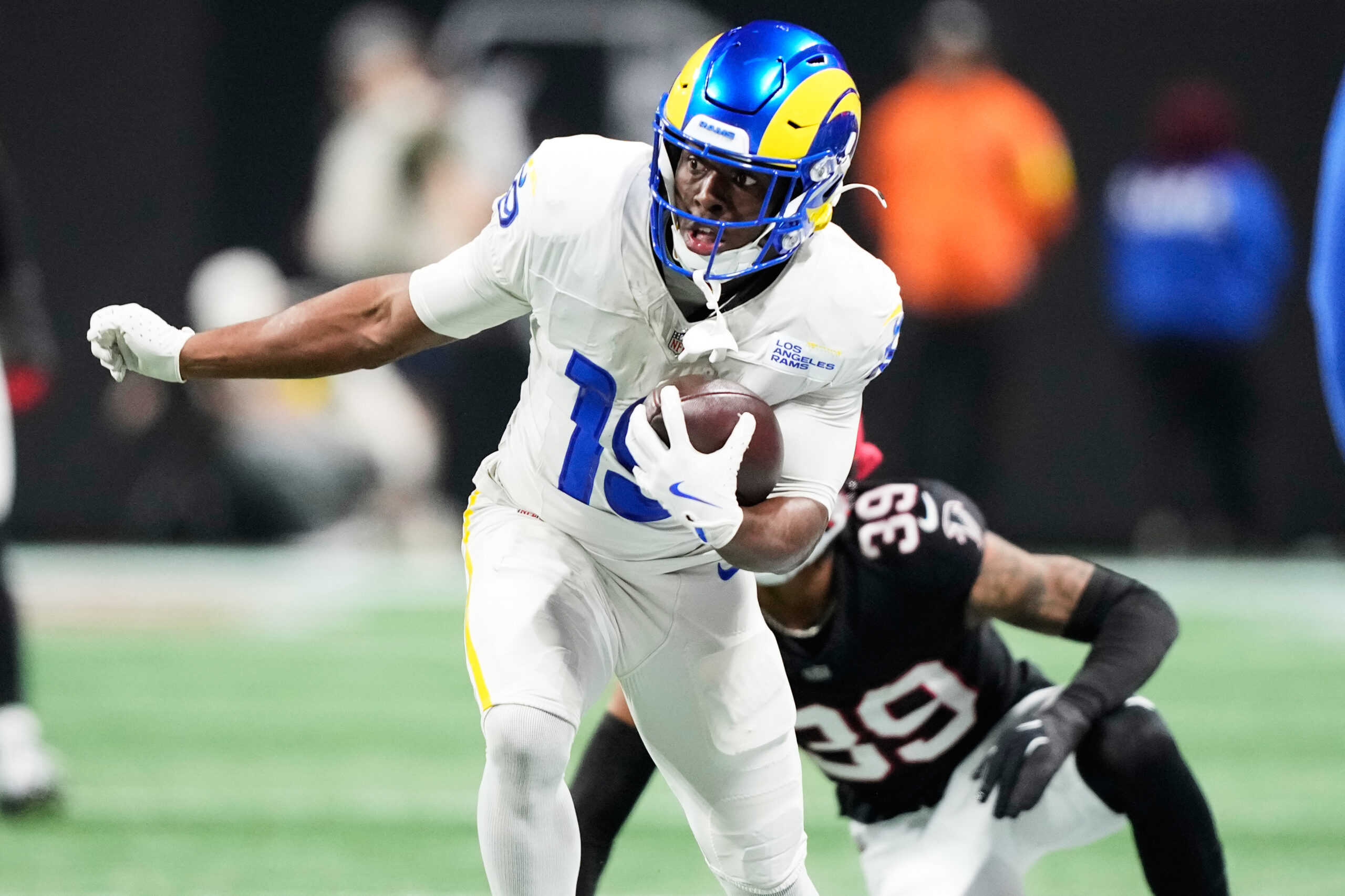 Rams wide receiver Xavier Smith (19) carries against Atlanta Falcons...