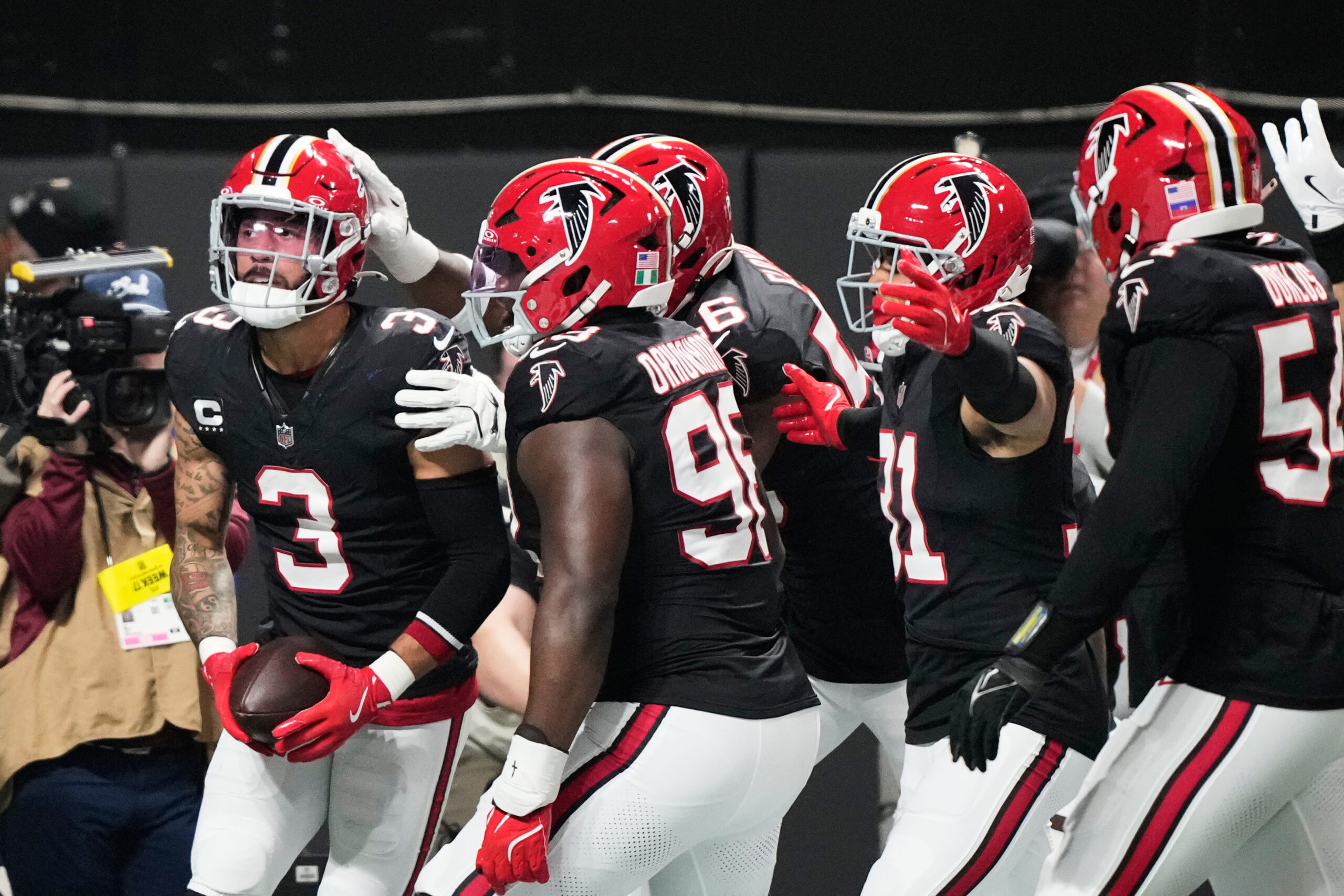 Atlanta Falcons safety Jessie Bates III (3) celebrates his pick-six...