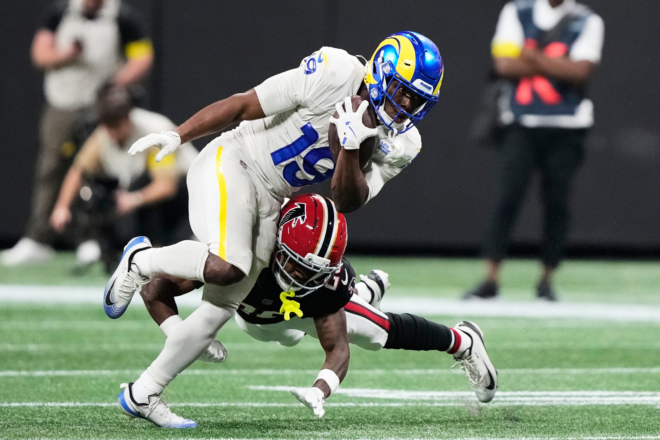 Rams wide receiver Xavier Smith (19) carries against Atlanta Falcons...