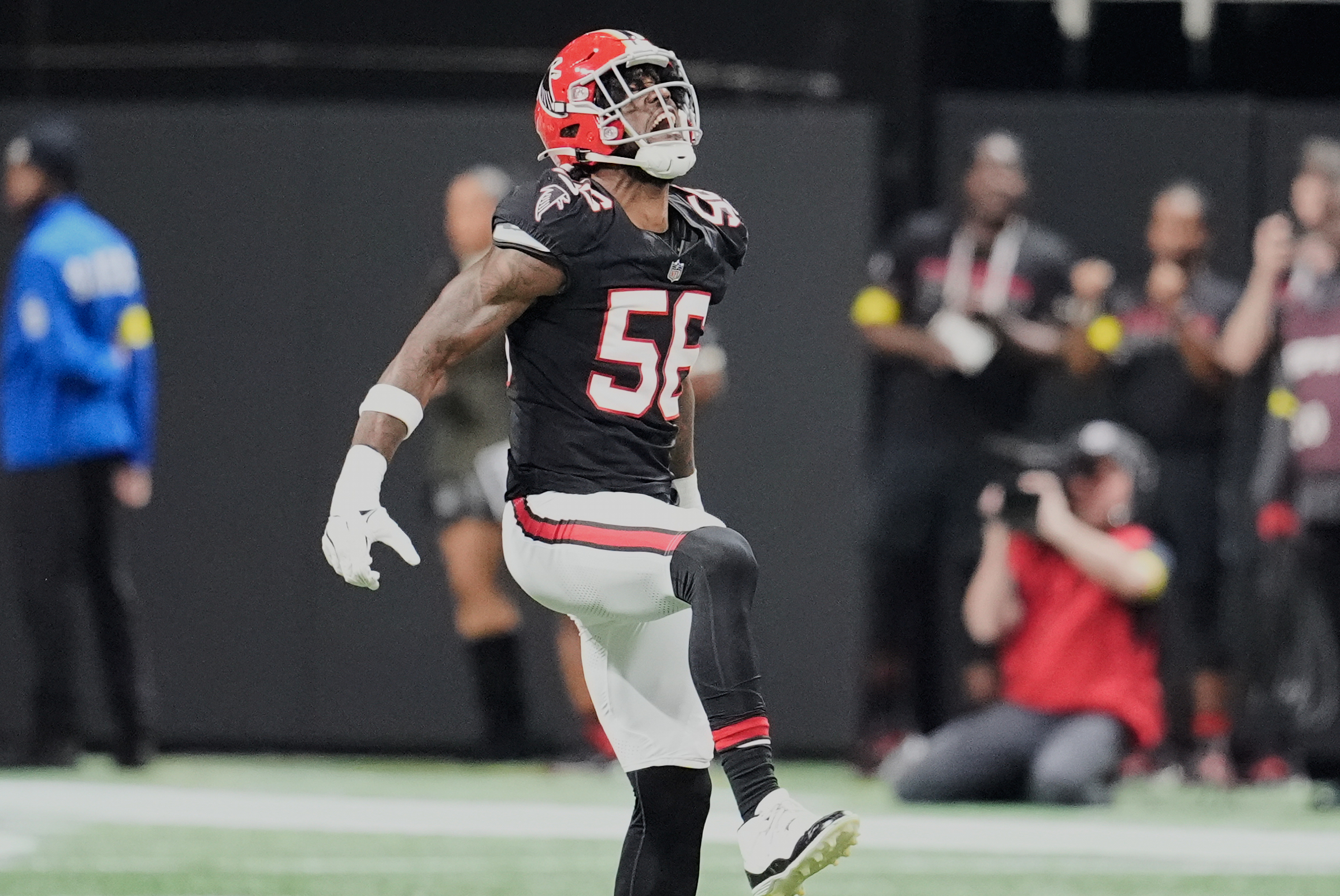 Atlanta Falcons defensive end Leonard Floyd (56) celebrates his sack...