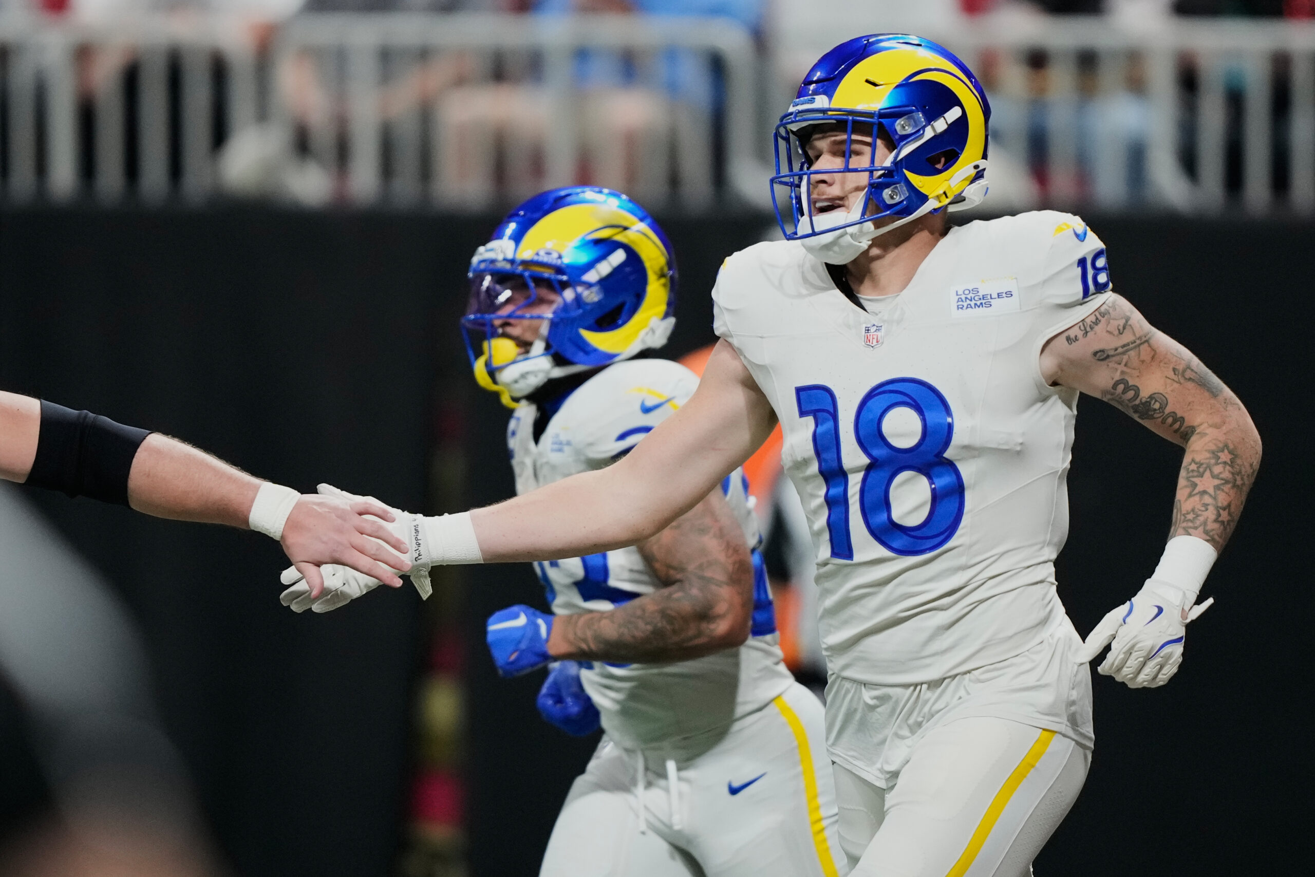 Rams tight end Terrance Ferguson (18) celebrates his touchdown reception...