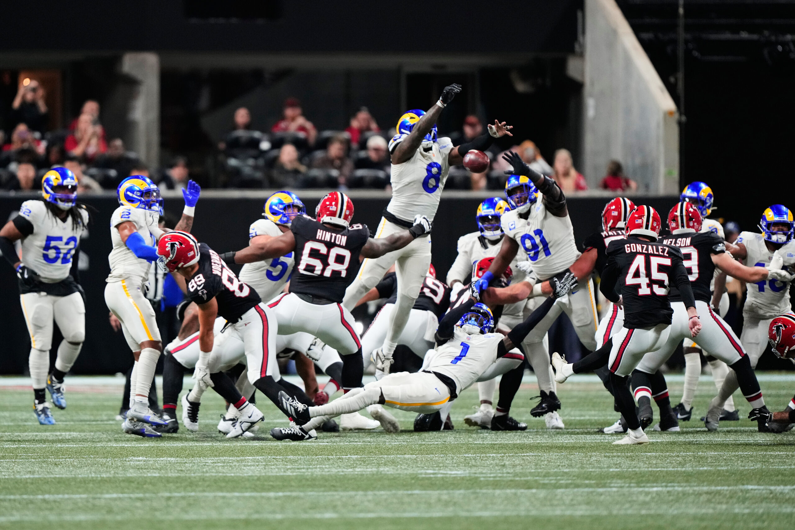 Rams linebacker Jared Verse (8) blocks a field goal attempt...