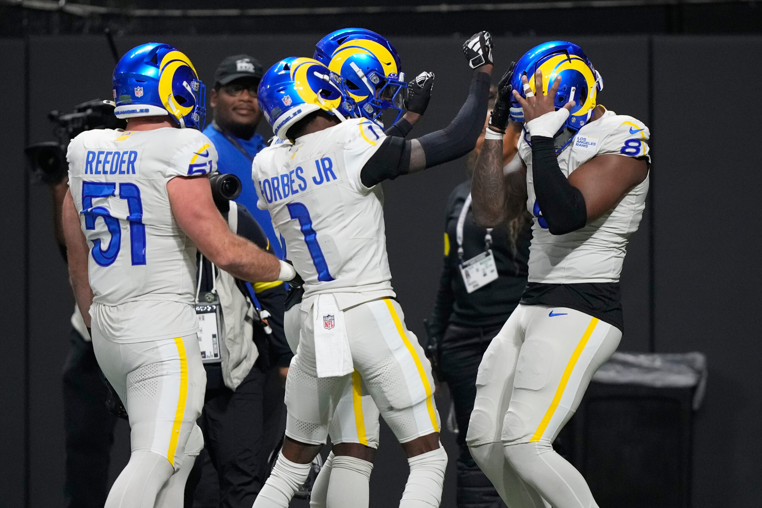 Rams linebacker Jared Verse (8) celebrates his touchdown after he...