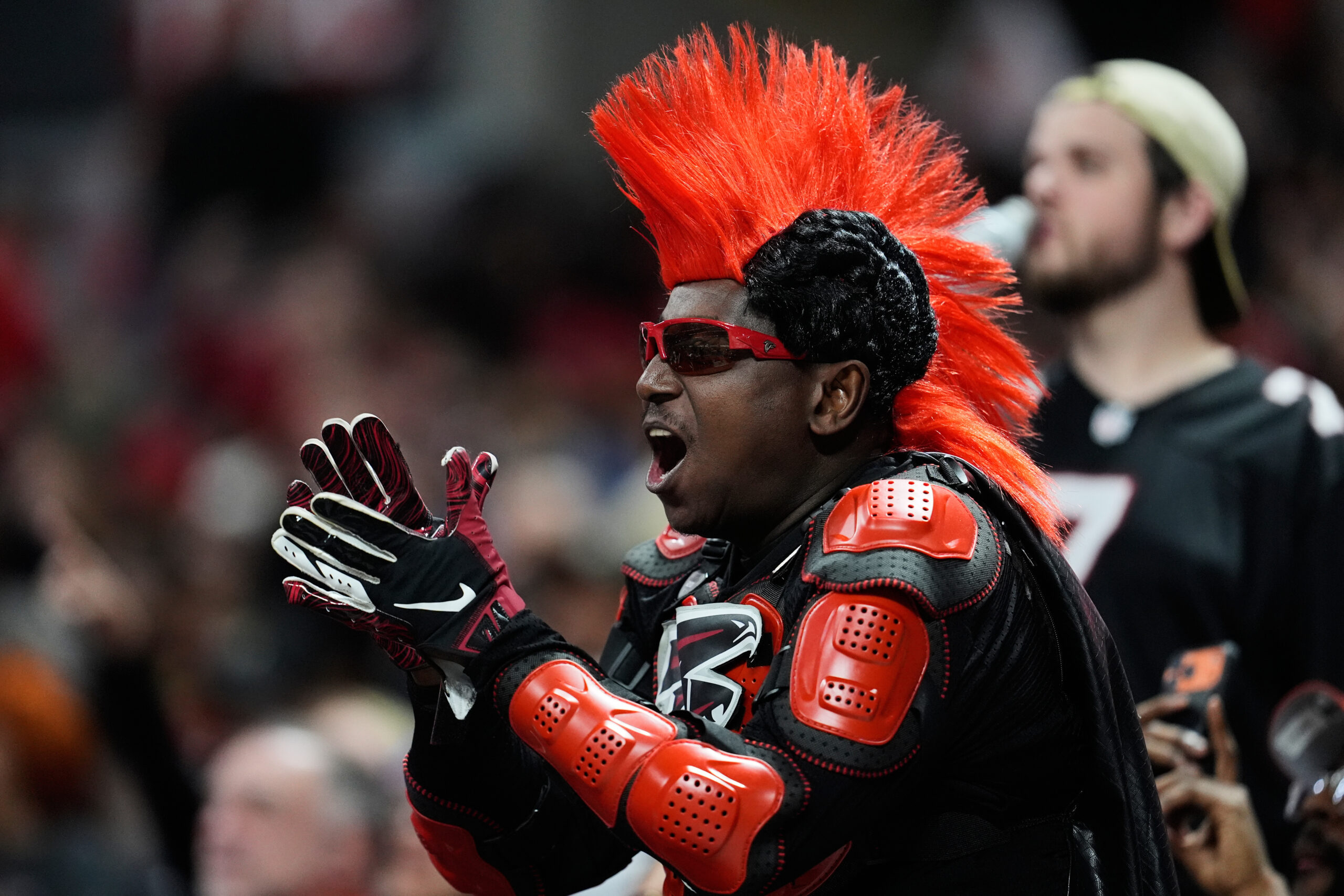 An Atlanta Falcons fan cheers in the second half of...