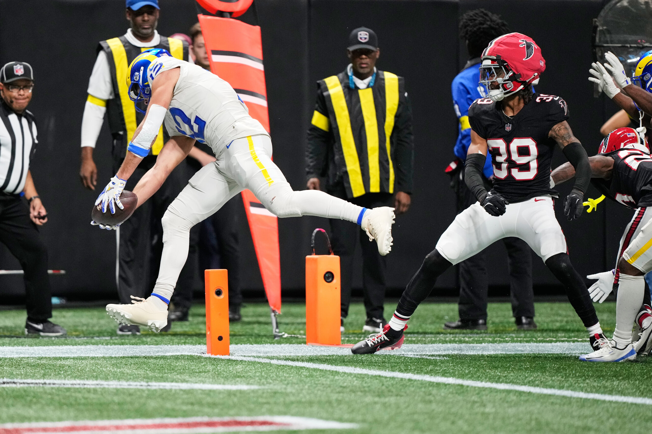 Rams wide receiver Puka Nacua (12) carries for a touchdown...