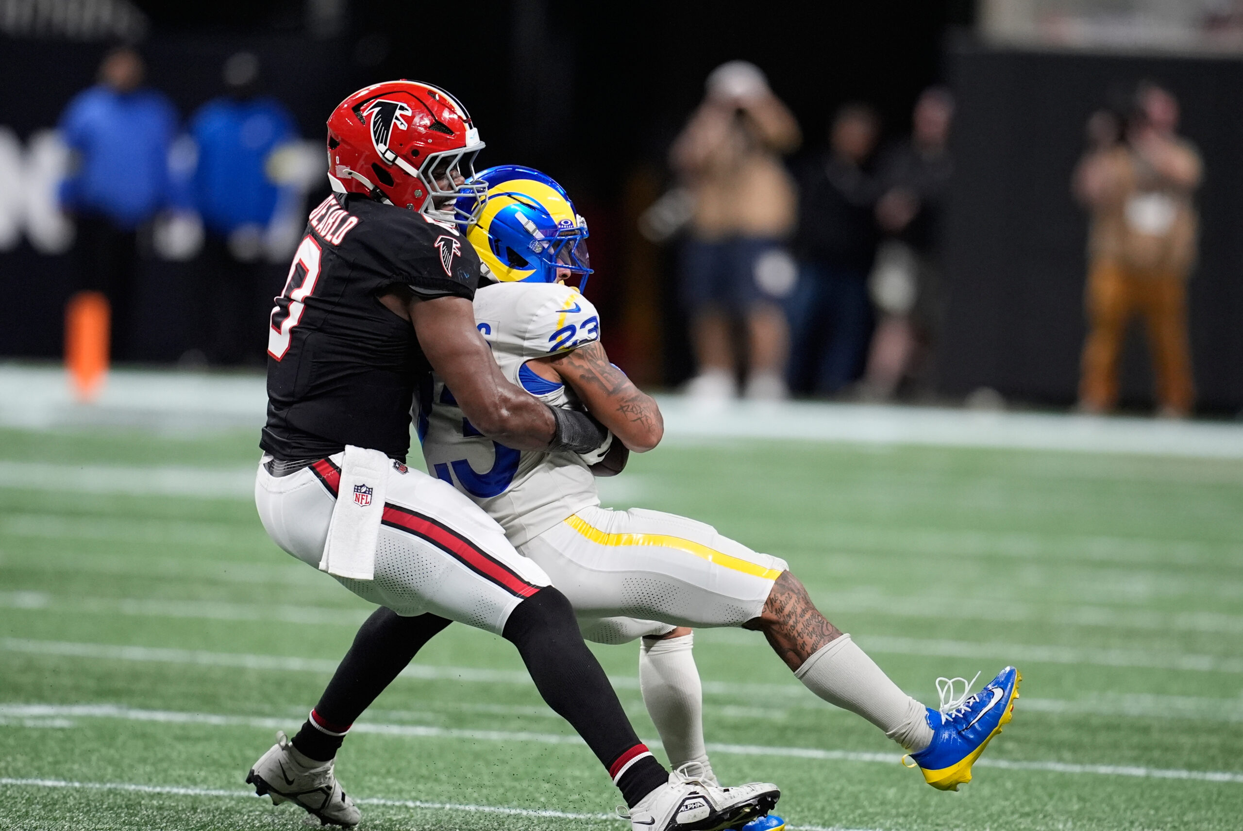 Rams running back Kyren Williams (23) is tackled by Atlanta...
