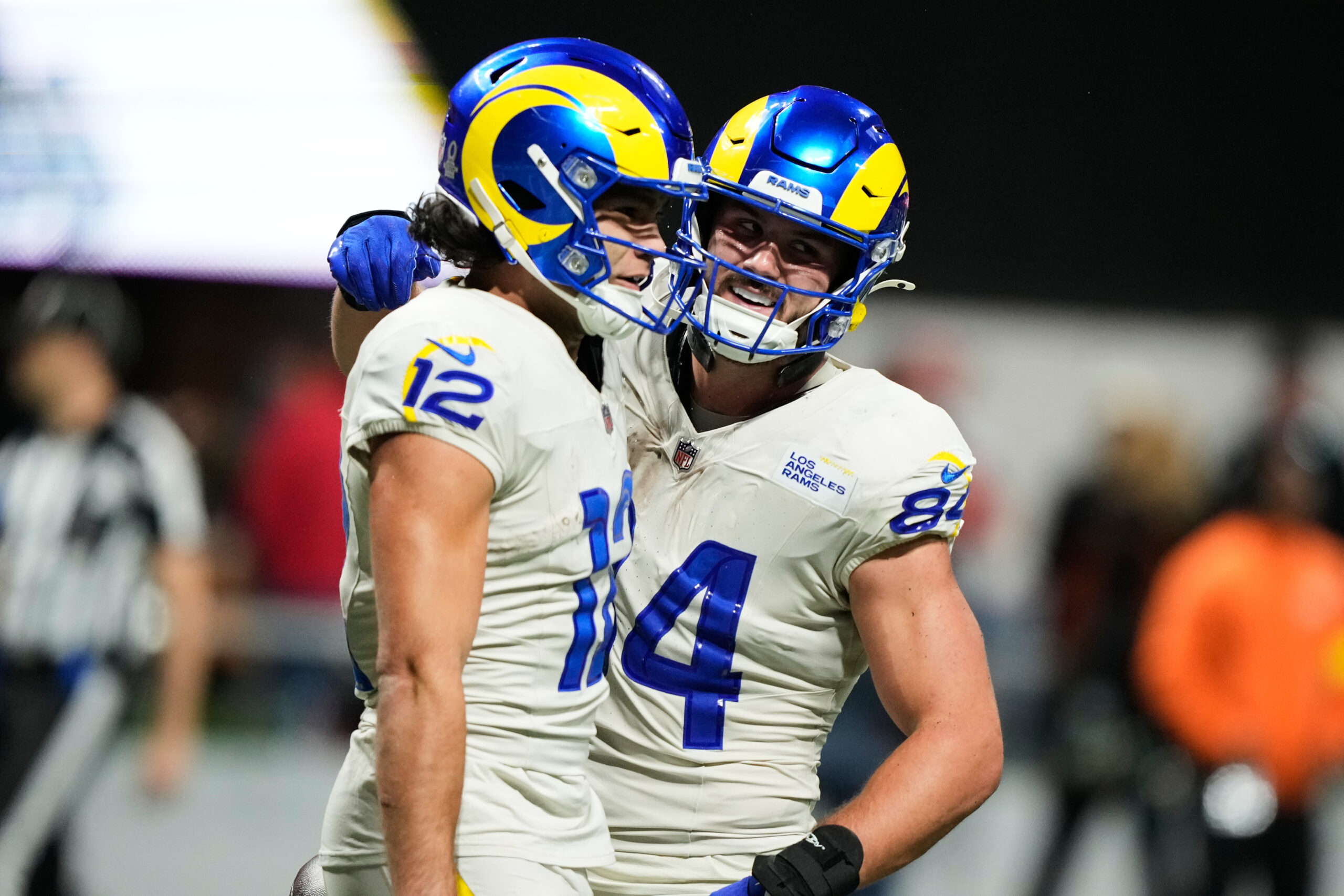 Rams wide receiver Puka Nacua (12) celebrates his touchdown with...