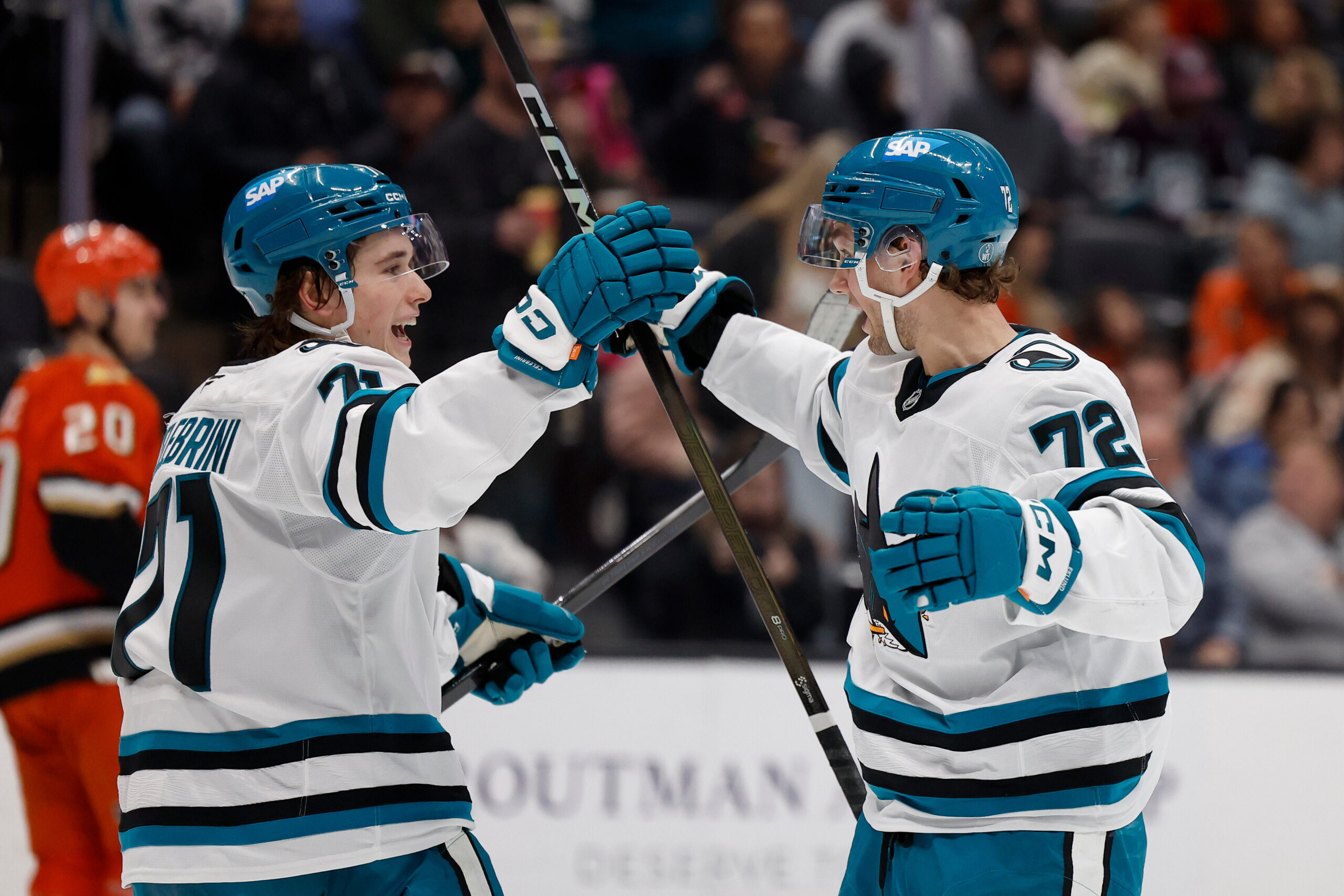 San Jose Sharks left wing William Eklund (72) is greeted...