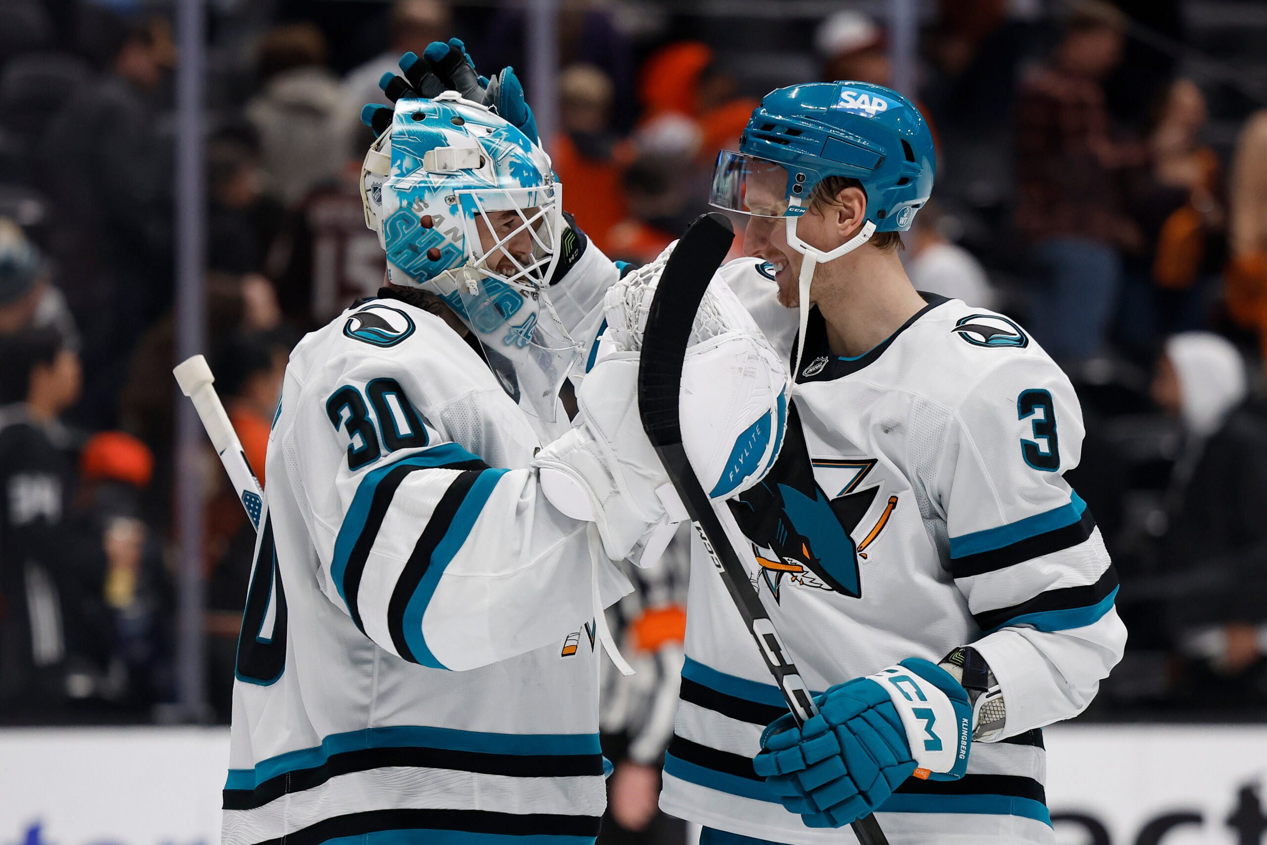San Jose Sharks goaltender Yaroslav Askarov (30) and San Jose...