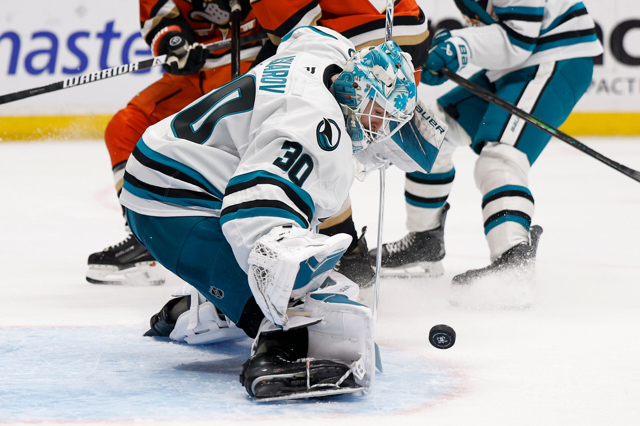 San Jose Sharks goaltender Yaroslav Askarov stops a shot on...