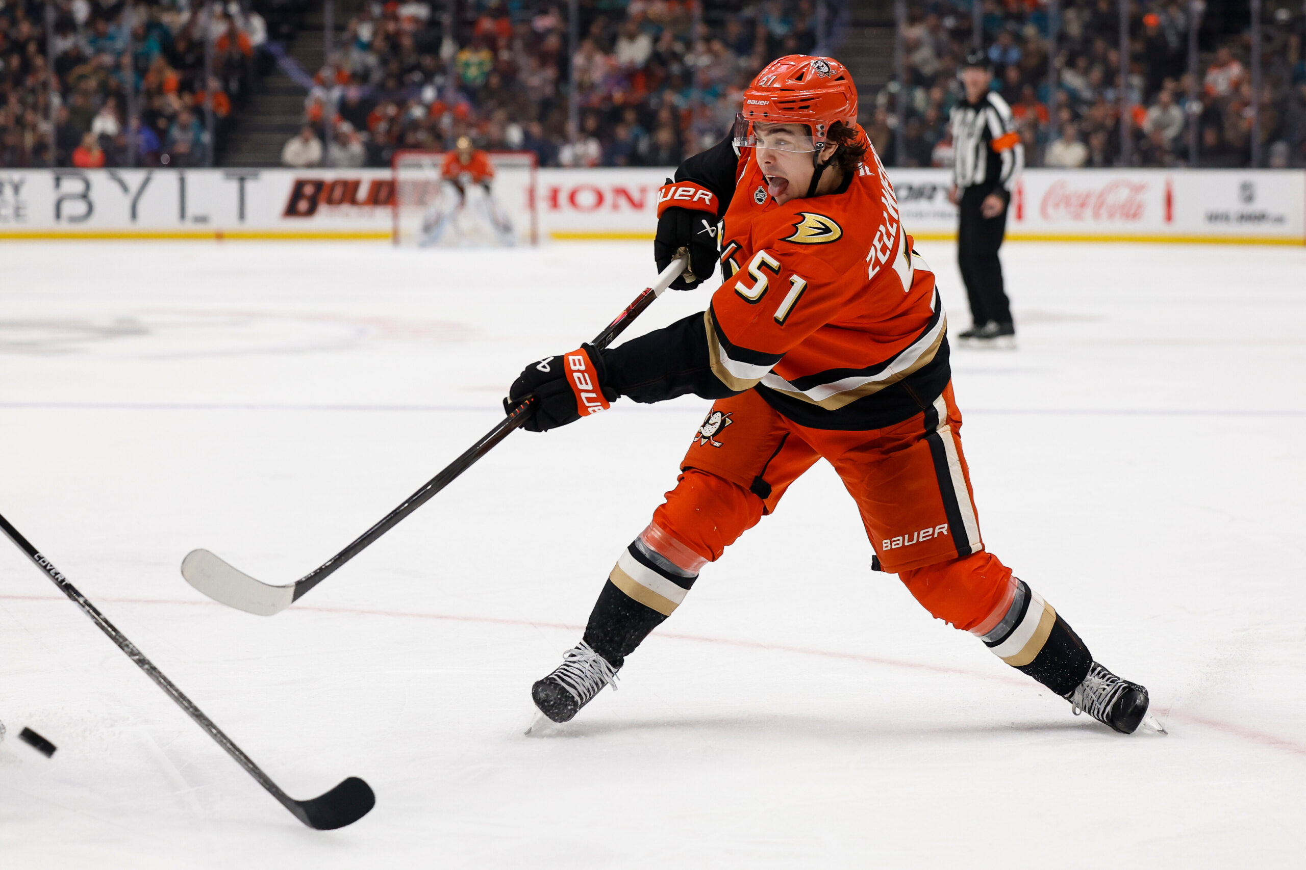 Ducks defenseman Olen Zellweger (51) takes a shot on goal...