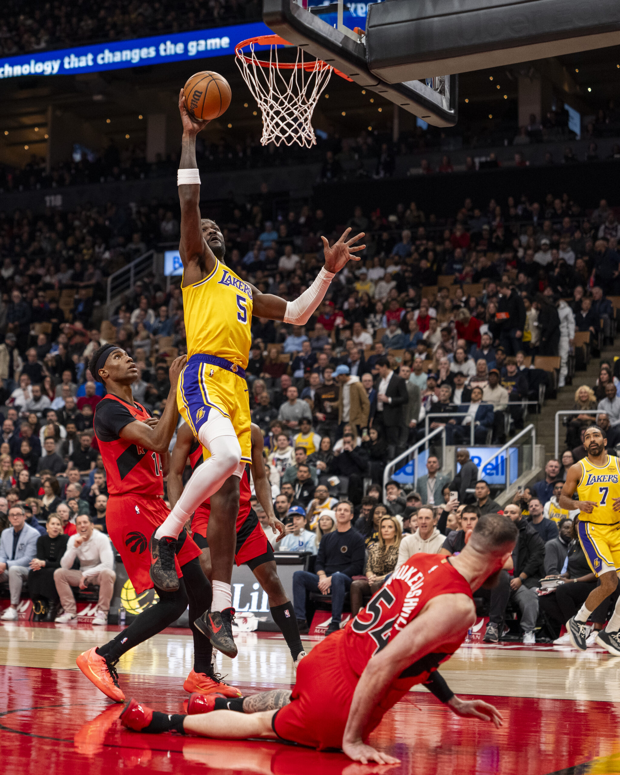 Lakers center Deandre Ayton gets to the basket for a...