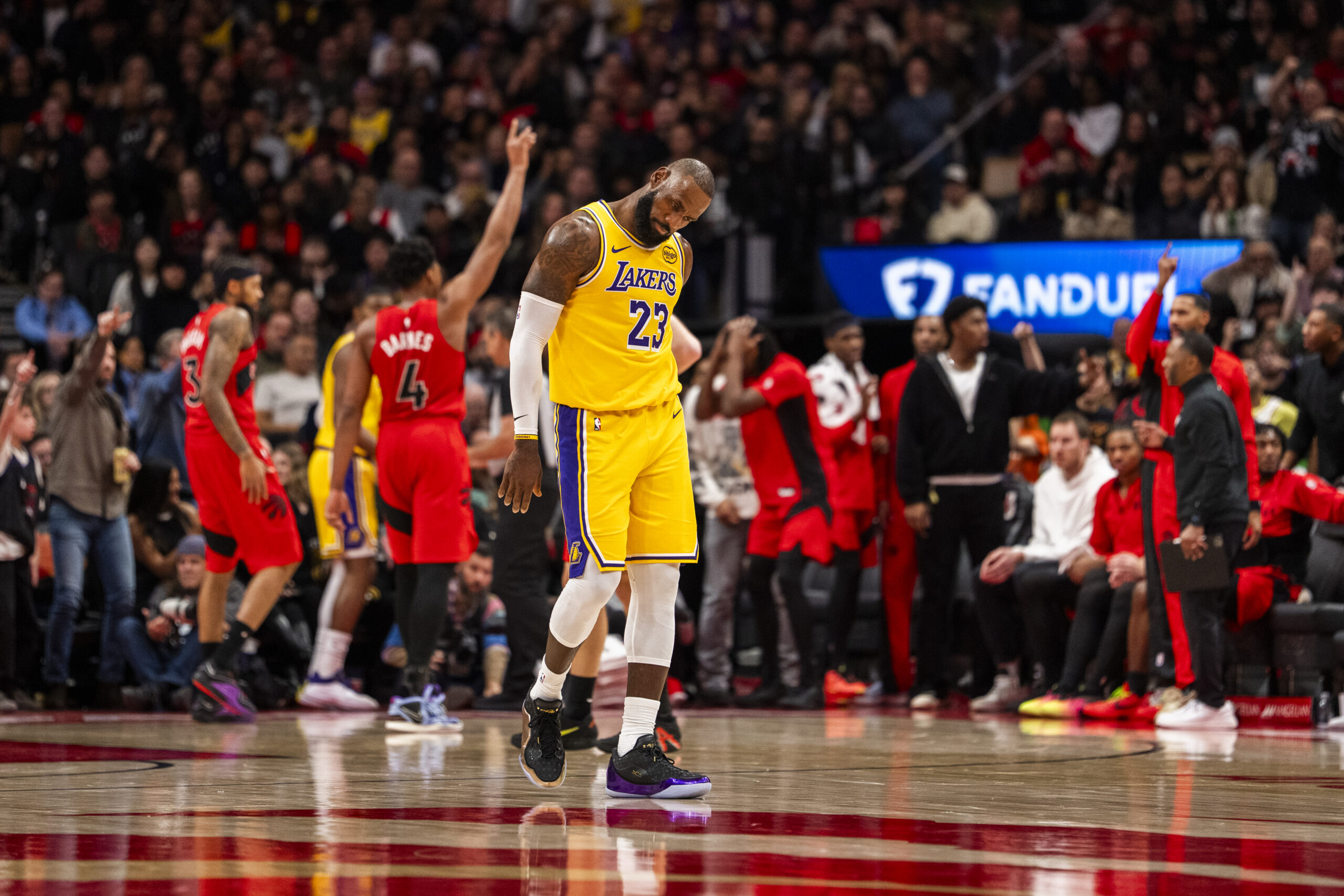 Lakers star LeBron James reacts after a foul call during...