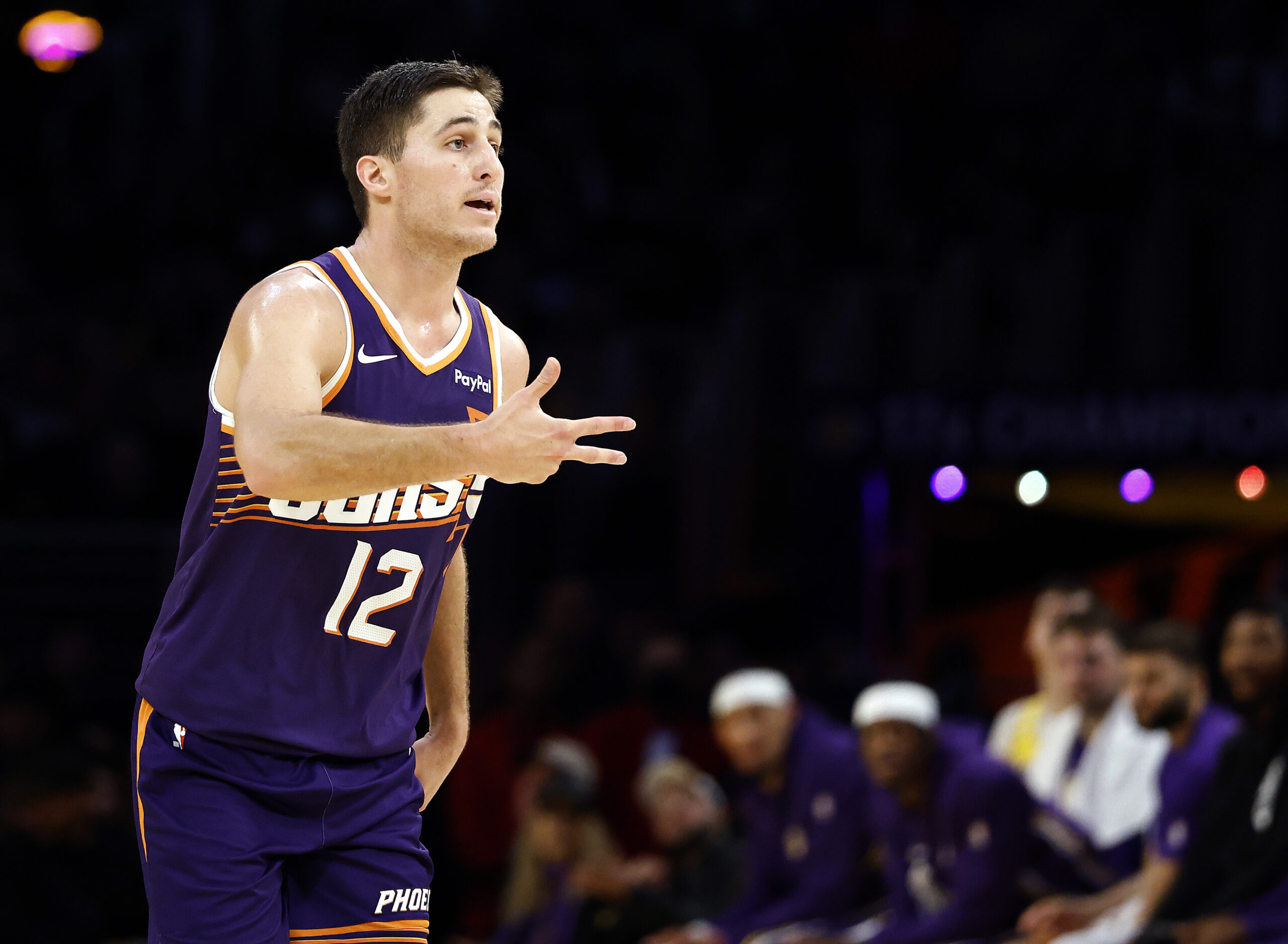 The Phoenix Suns’ Collin Gillespie gestures after making a 3-point...