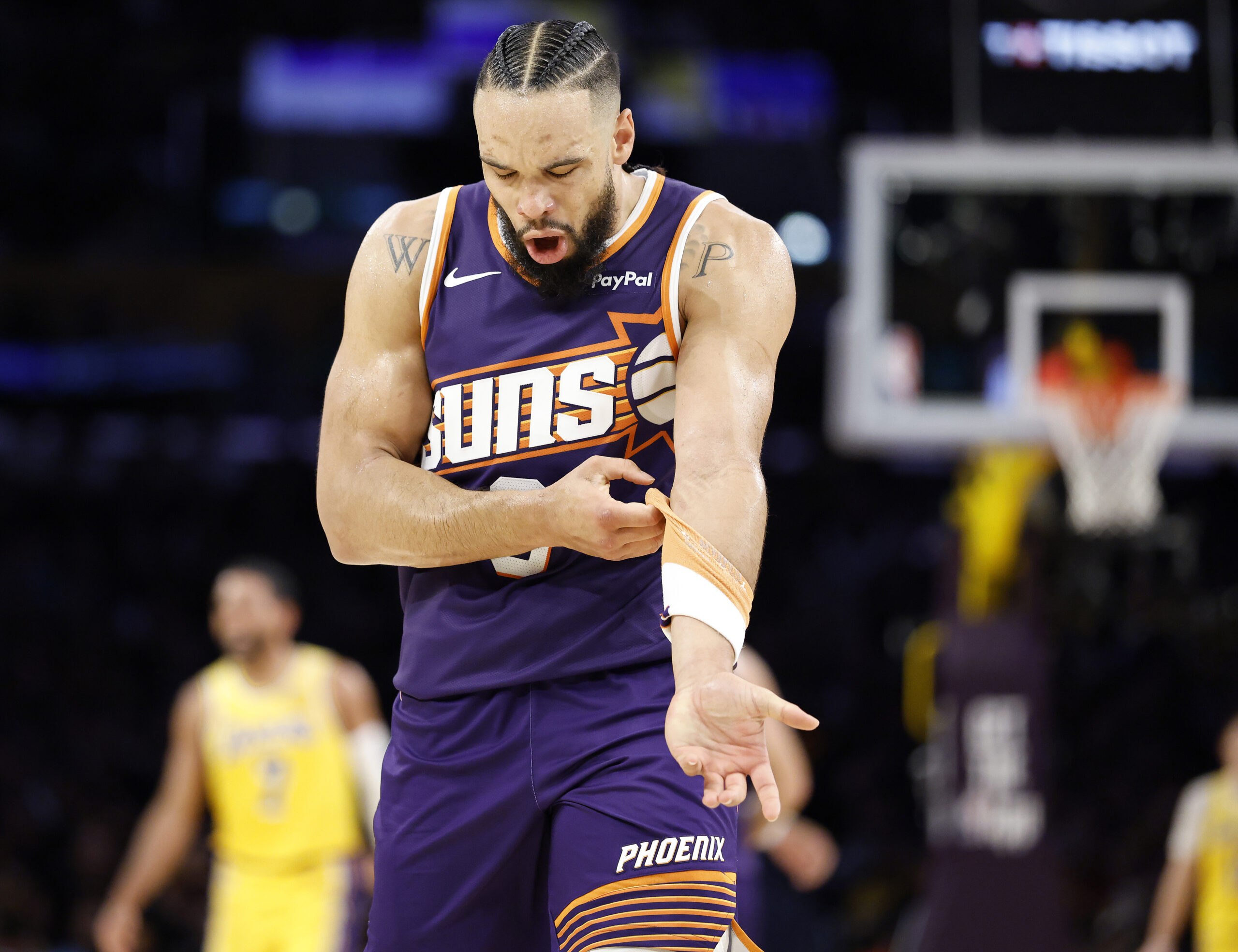 Phoenix Suns forward Dillon Brooks celebrates a basket during the...