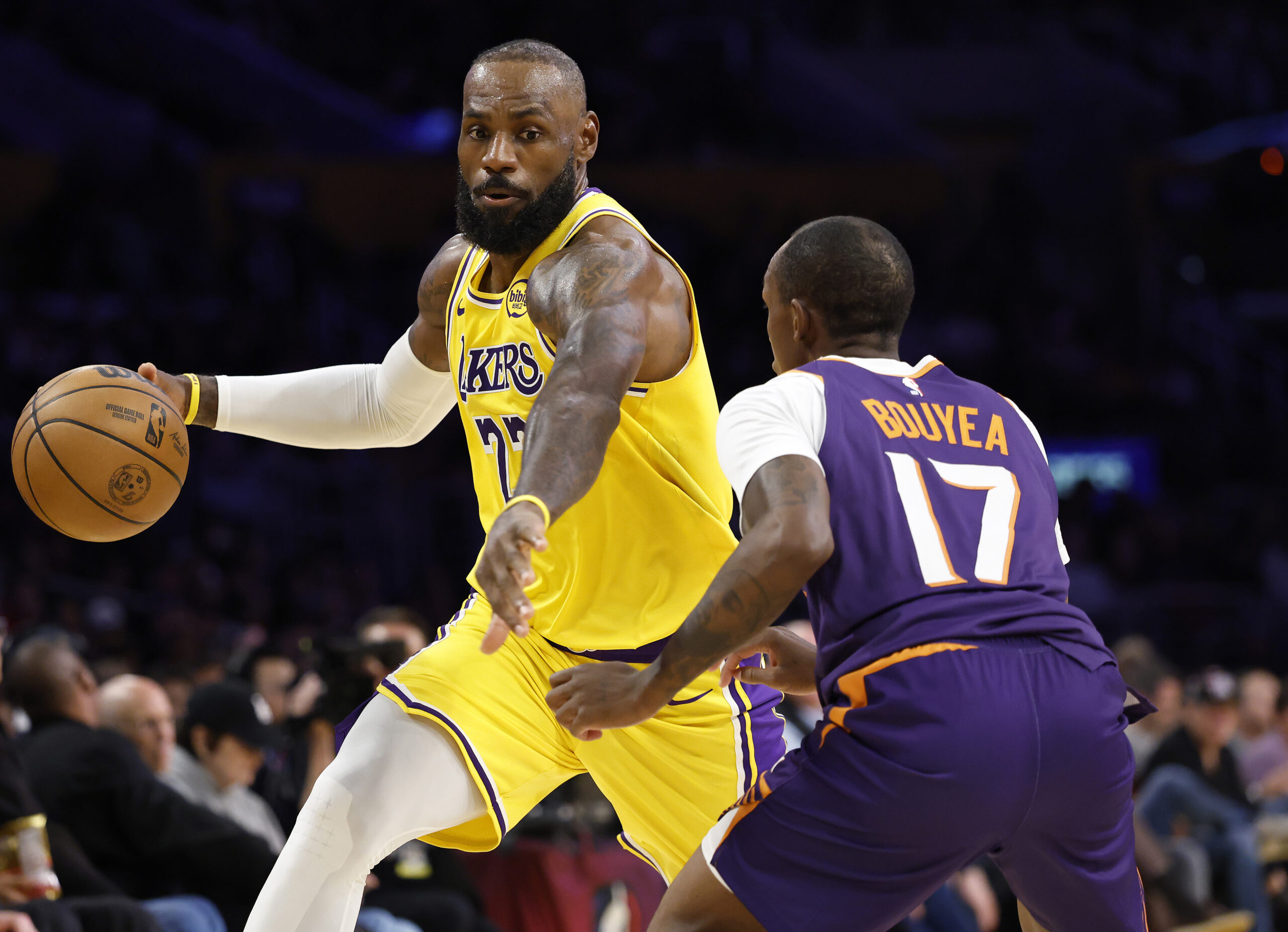 Lakers star LeBron James drives as the Phoenix Suns’ Jamaree...