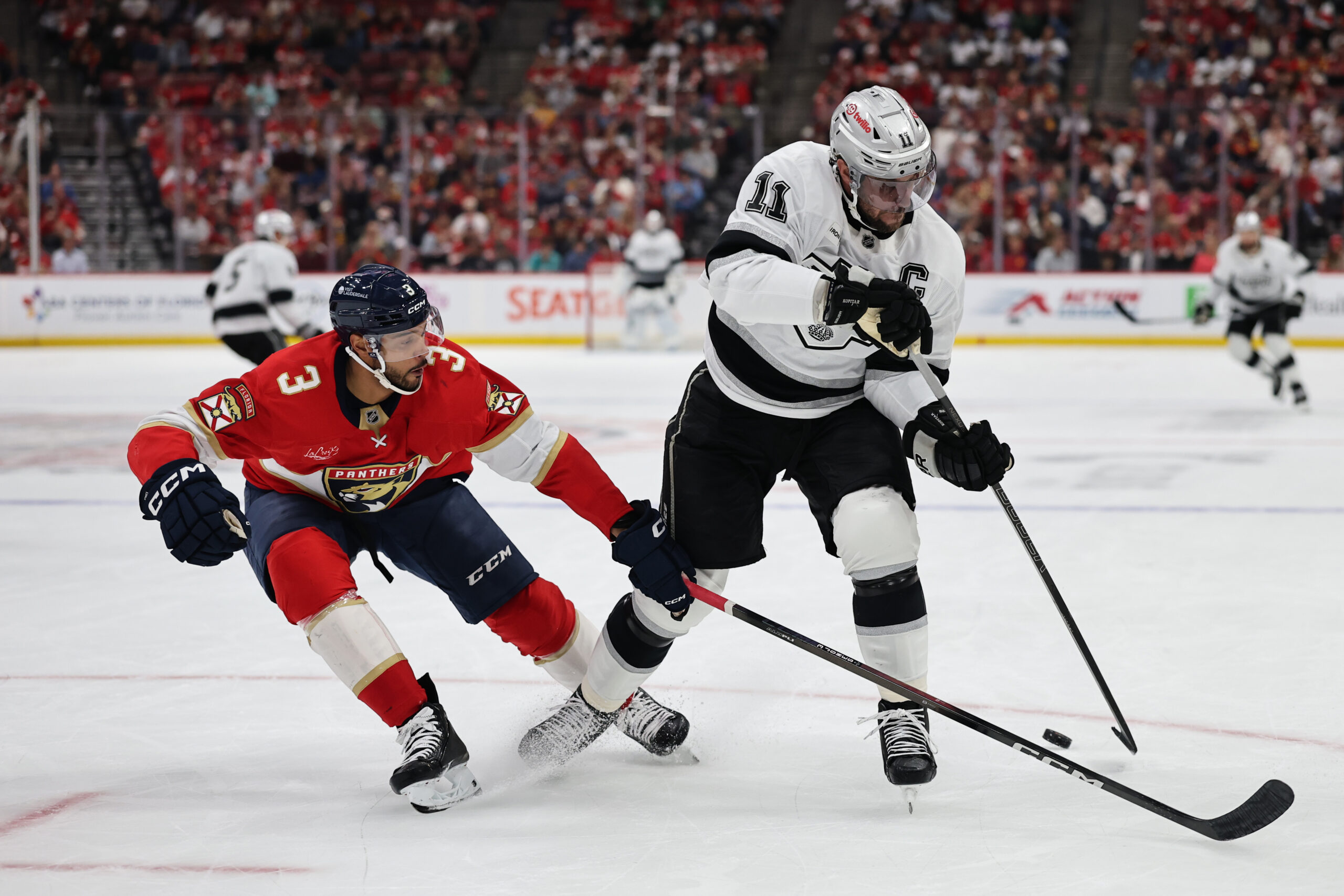 The Florida Panthers’ Seth Jones, left, and Kings captain Anze...