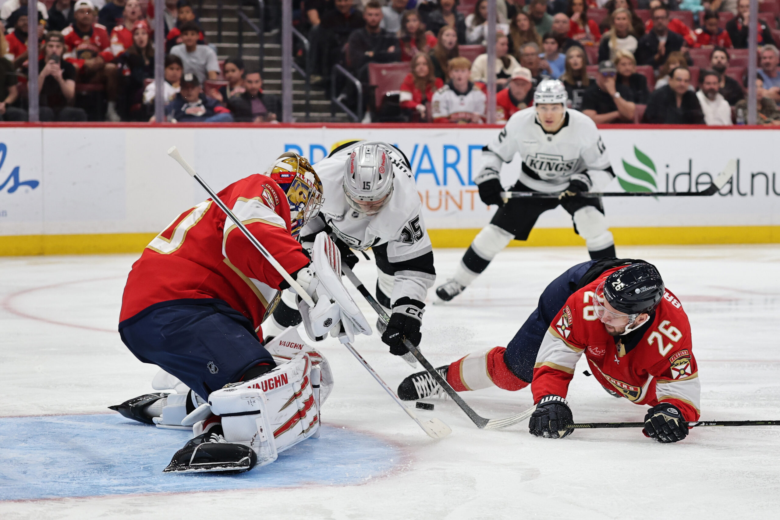 The Florida Panthers’ Uvis Balinskis, right, and goaltender Daniil Tarasov...