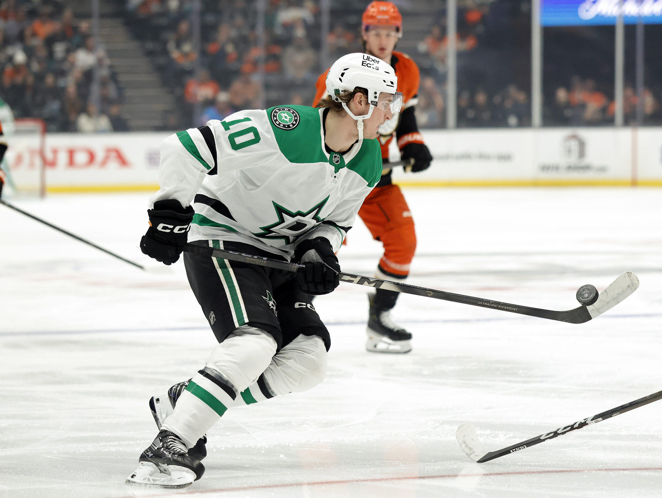 The Dallas Stars’ Oskar BÃ¤ck skates with the puck on...