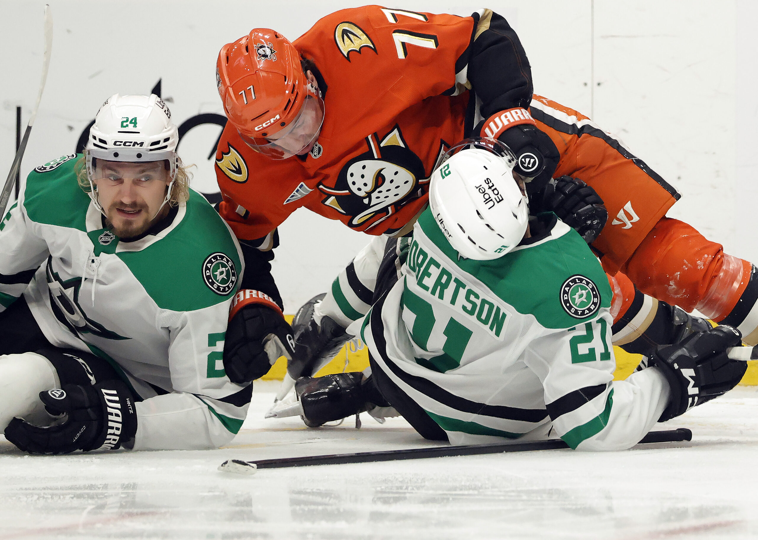 The Ducks’ Frank Vatrano (77) flips the Dallas Stars’ Jason...