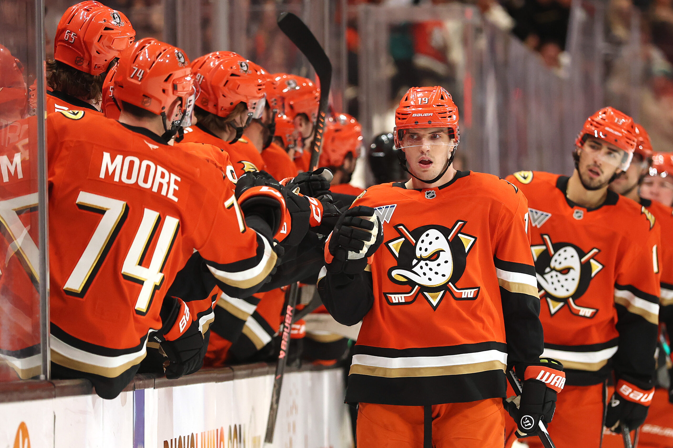 Ducks right wing Troy Terry is congratulated at the bench...