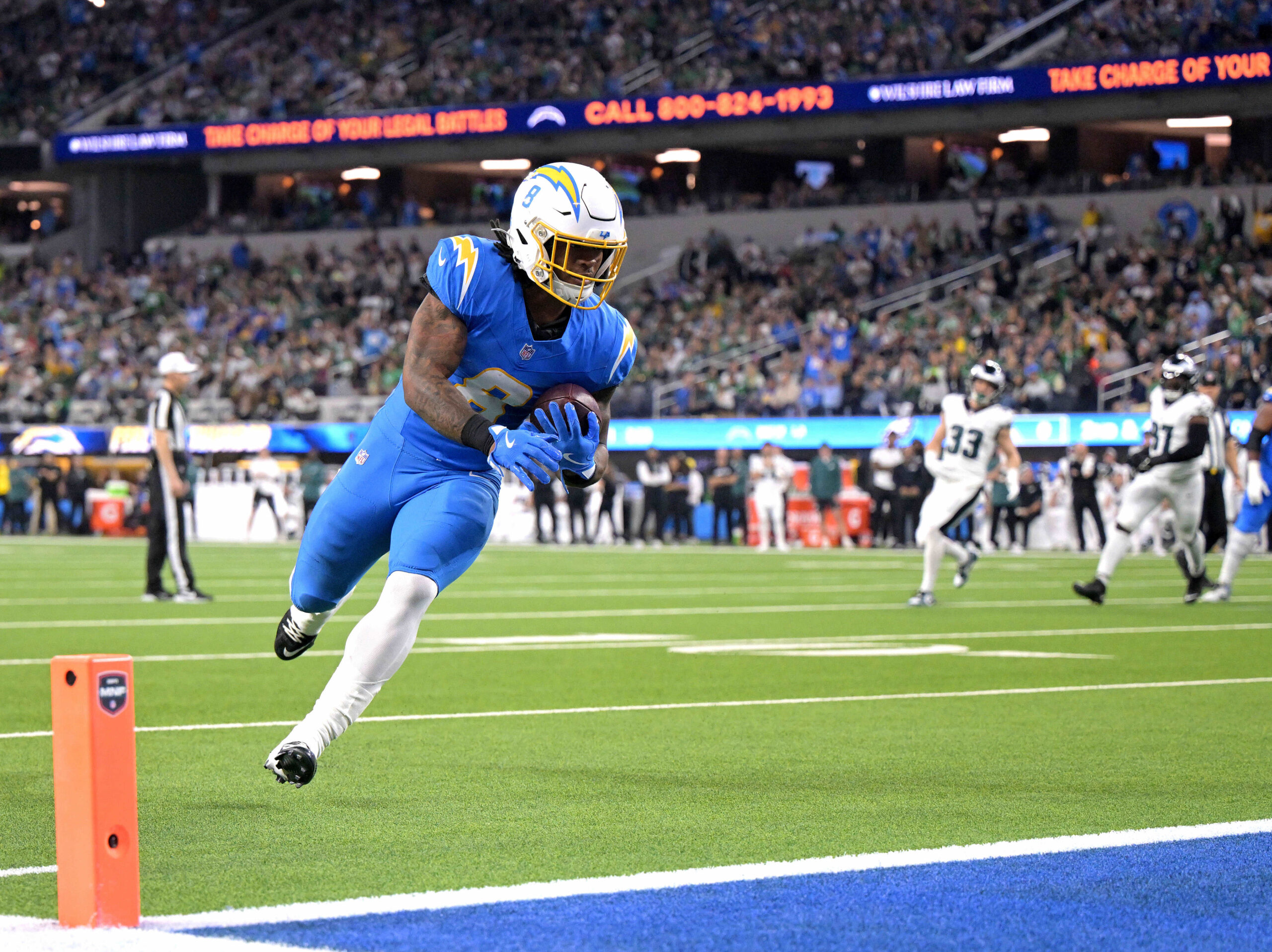 Chargers running back Omarion Hampton scores on a short touchdown...