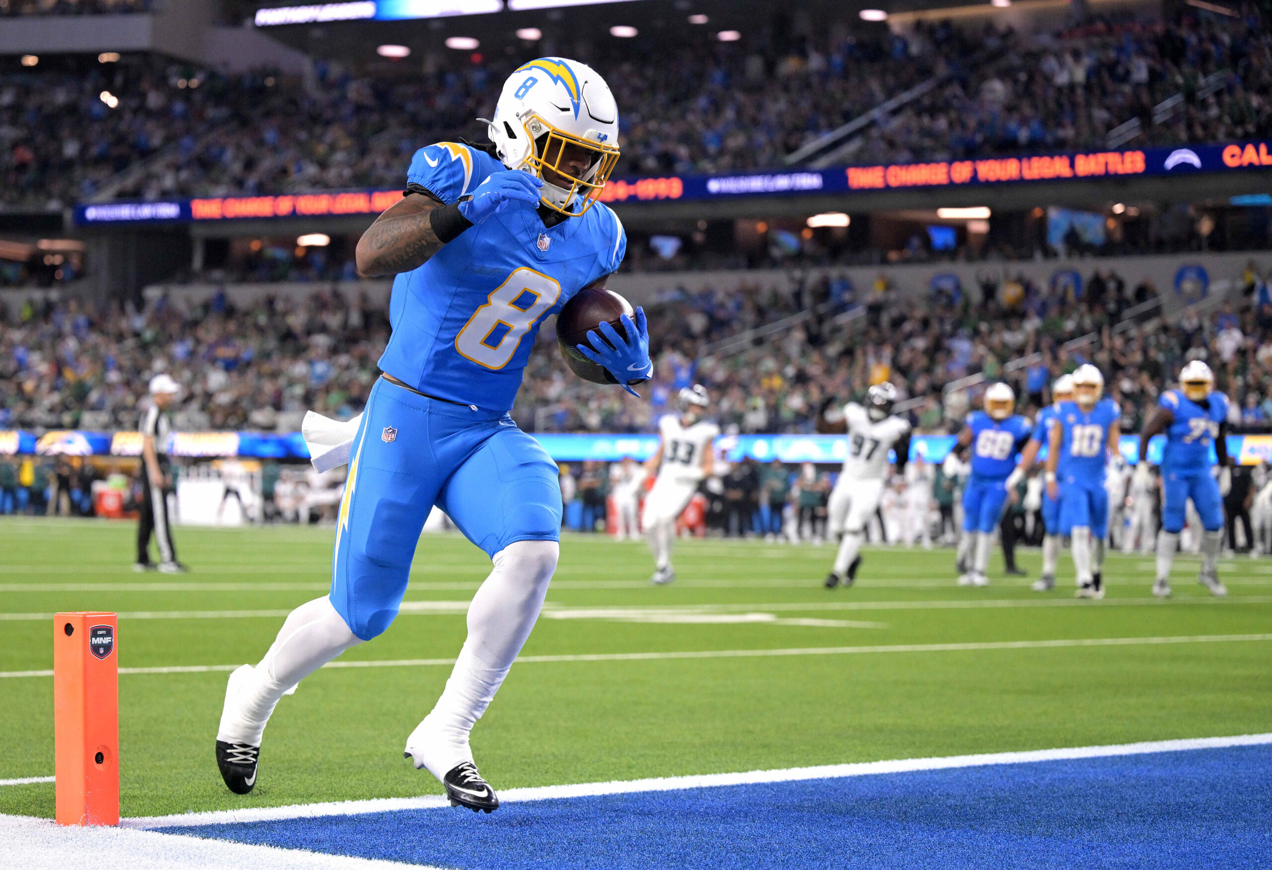 Chargers running back Omarion Hampton scores on a short touchdown...