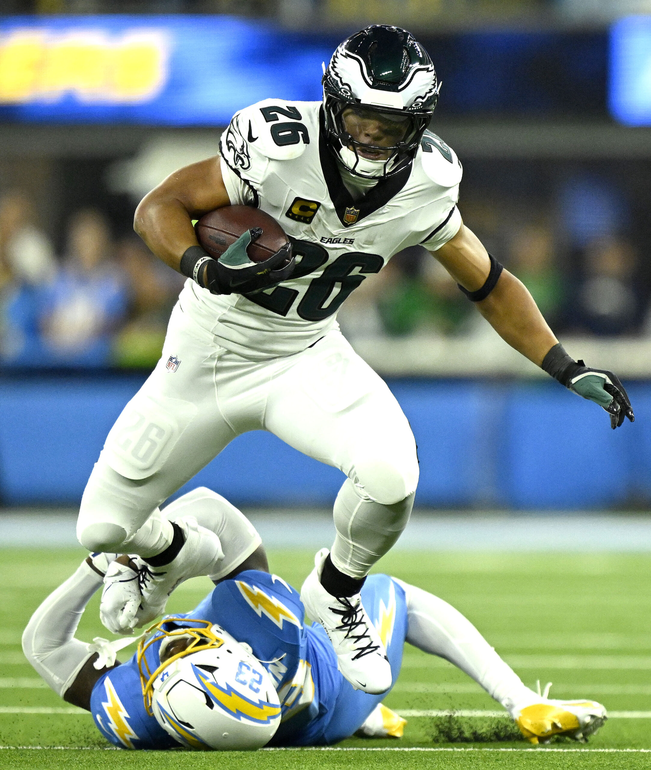 Chargers safety Tony Jefferson, bottom, tackles Philadelphia Eagles running back...