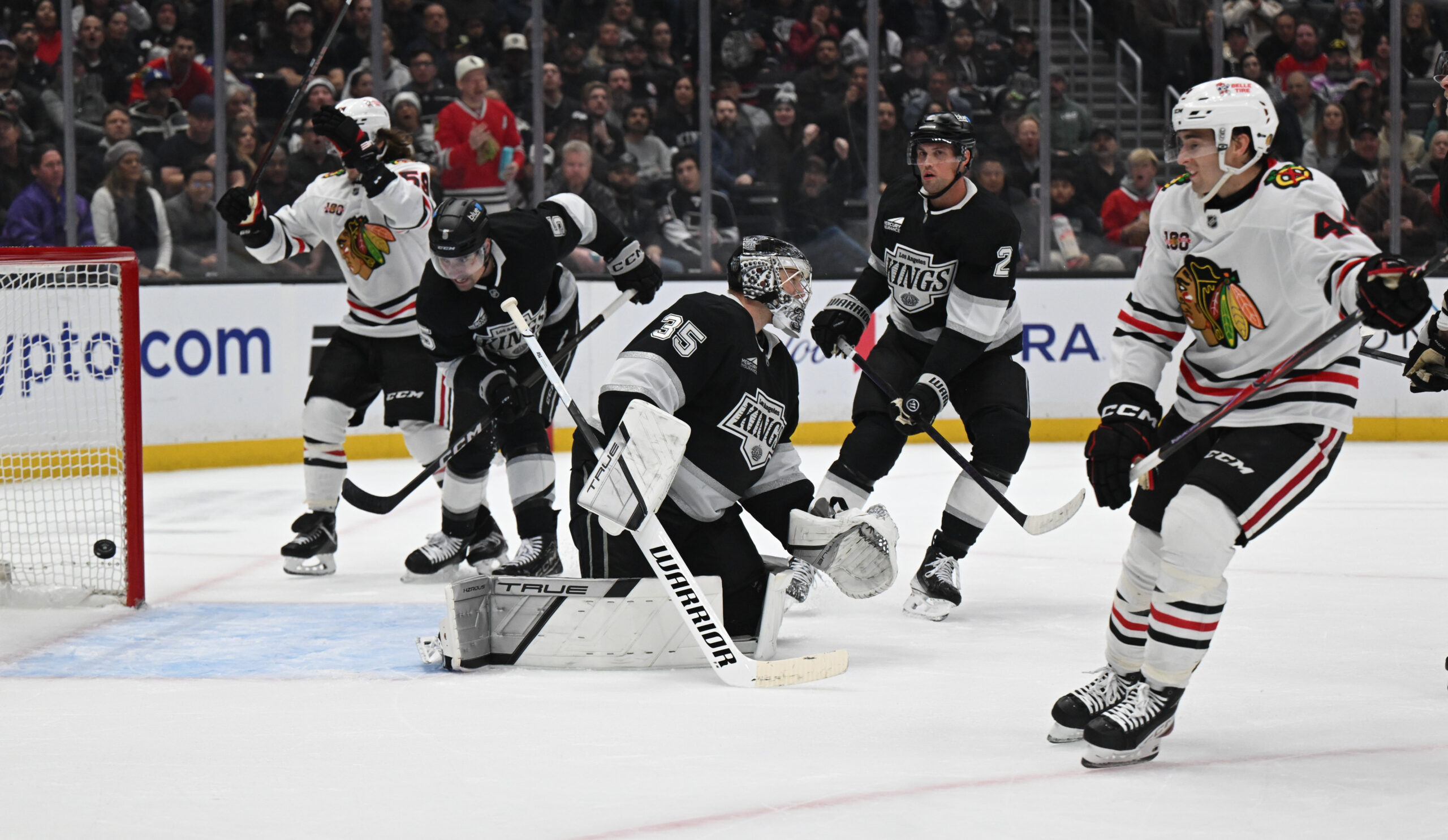 Blackhawks Wyatt Kaiser (44) scores on Kings goalie Darcy Kuemper...